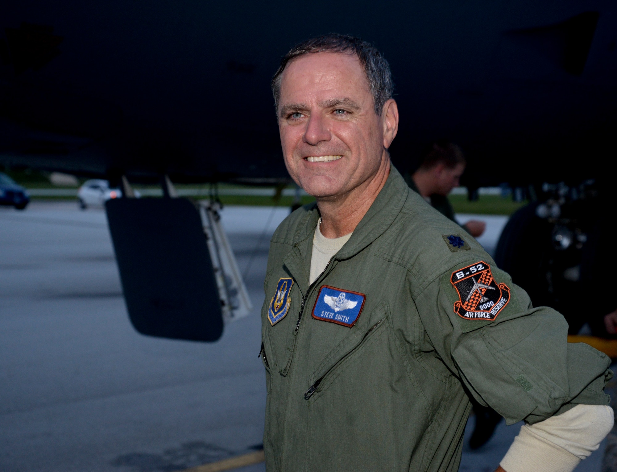 U.S. Air Force Lt. Col. Steve Smith, 93rd Bomb Squadron from Barksdale Air Force Base, La., B-52 Stratofortress radar navigator, celebrates reaching 9,000 flying-hours, Oct. 8, 2014, at Andersen Air Force Base, Guam. Smith currently has the most flying hours in a B-52H; the next aviator is 2,000 hours behind him. (U.S. Air Force photo by Staff Sgt. Robert Hicks/Released)