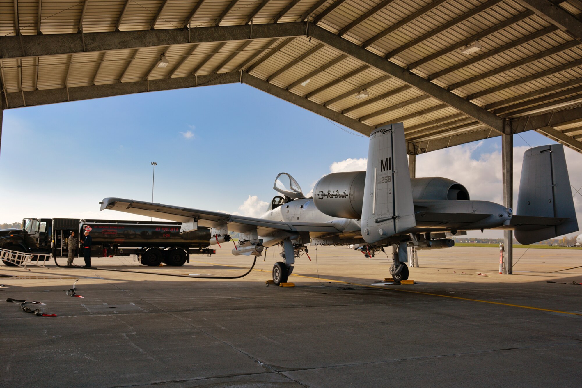 141015-Z-MI929-014 – A fuels technician and an aircraft crew chief refuel an A-10 Thunderbolt II aircraft at Selfridge Air National Guard Base, Mich., Oct. 15, 2014. The fuels shop at Selfridge recently began using Jet A+ fuel, switching from JP-8, a change that is being made across the Department of Defense. (U.S. Air National Guard photo by Terry Atwell)