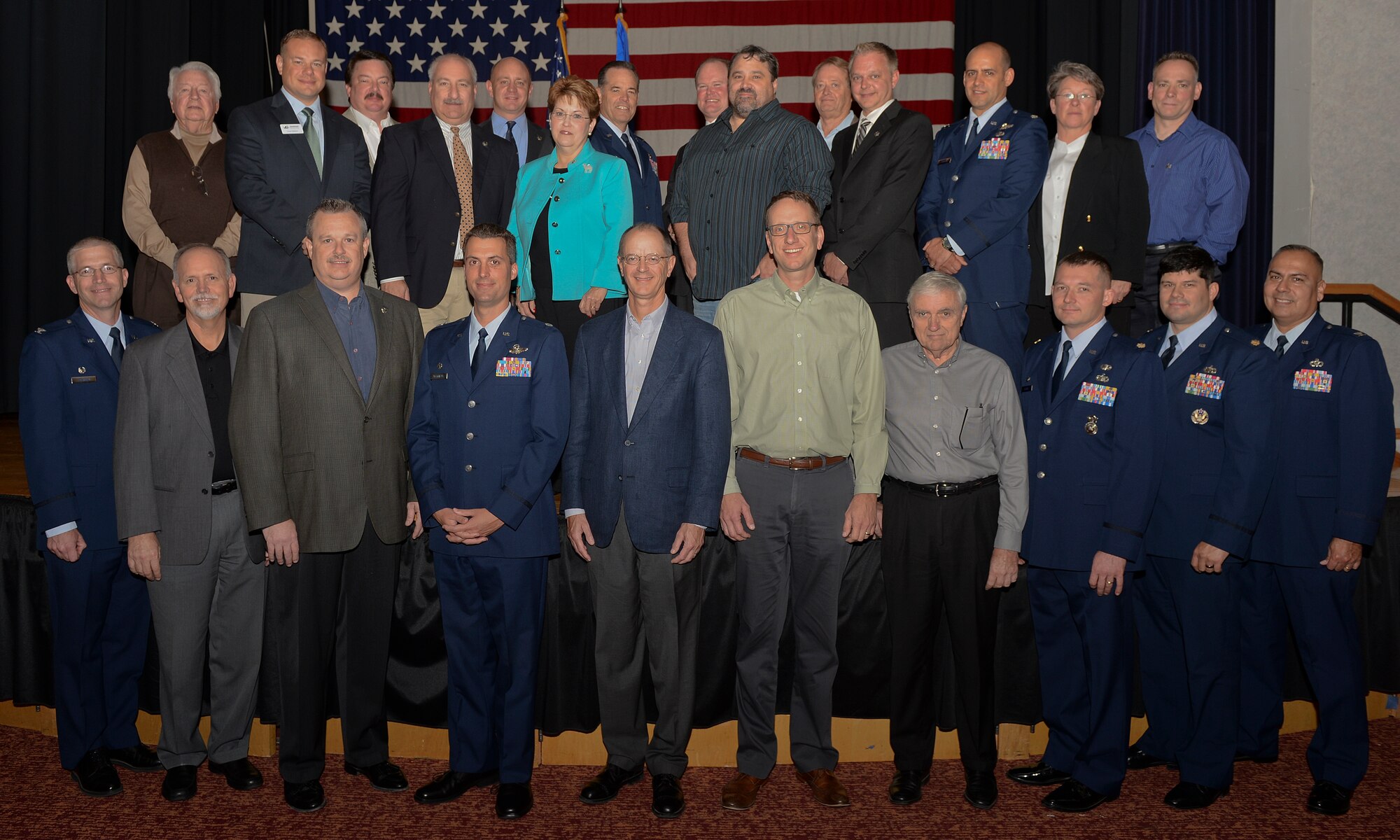 McConnell Air Force Base Honorary Commanders pose for a picture following an Honorary Commander Change of Command ceremony held on base Oct. 15, 2014. The 931st Air Refueling Group welcomed James Havers-Strong, ABI Group of Companies CEO and managing director, to its ranks. (U.S. Air Force photo by Airman 1st Class Colby Hardin)
