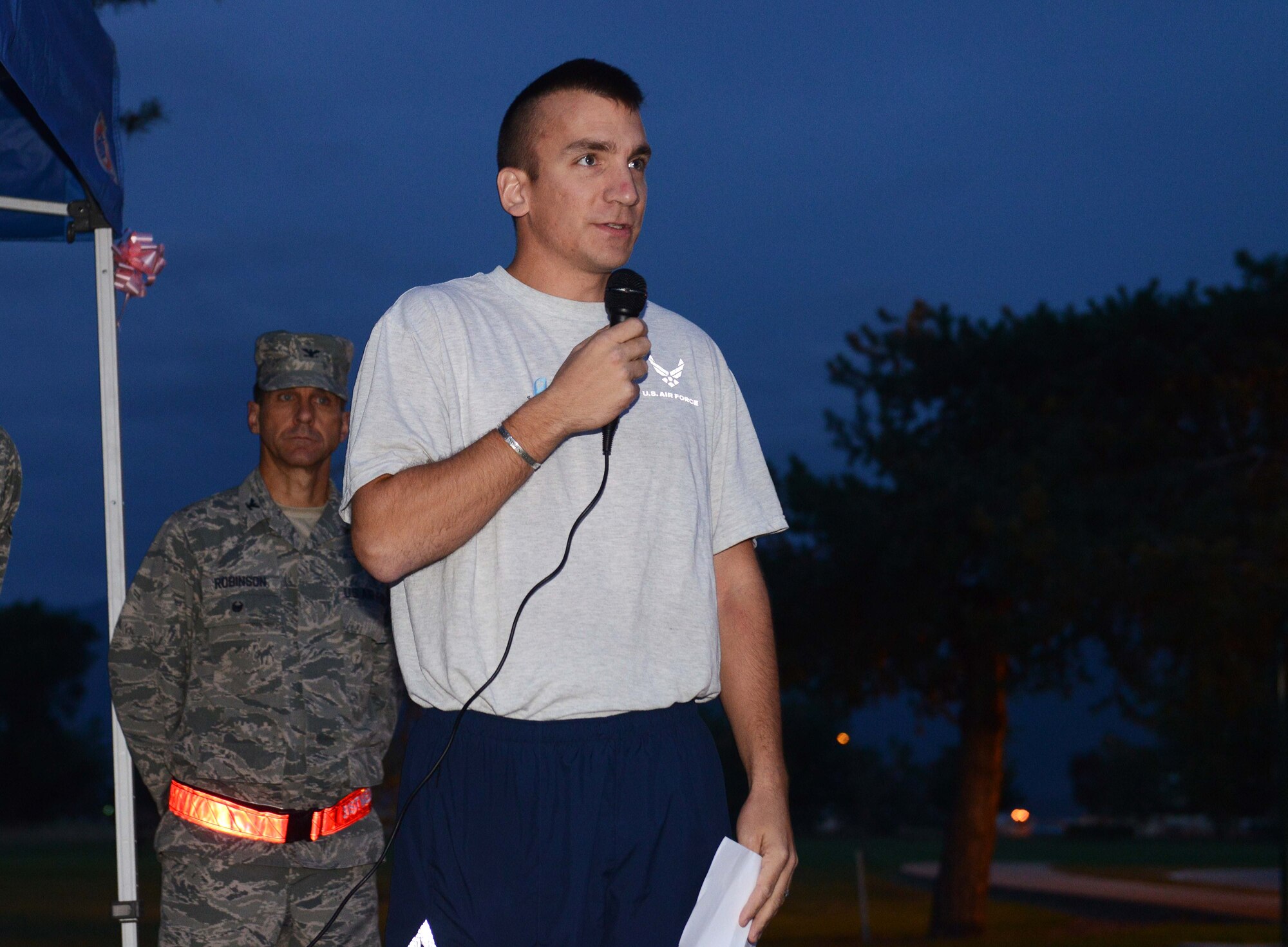 Chaplain (Capt.) Matthew Gallo, 31st Fighter Wing chaplain, prays before a Sudden Infant Death Syndrome awareness 5K, Oct. 15, 2014, at Aviano Air Base, Italy. The Aviano Base Chapel office offers grief counseling for personnel coping with the loss of a loved one. (U.S. Air Force photo/Airman 1st Class Deana Heitzman)  