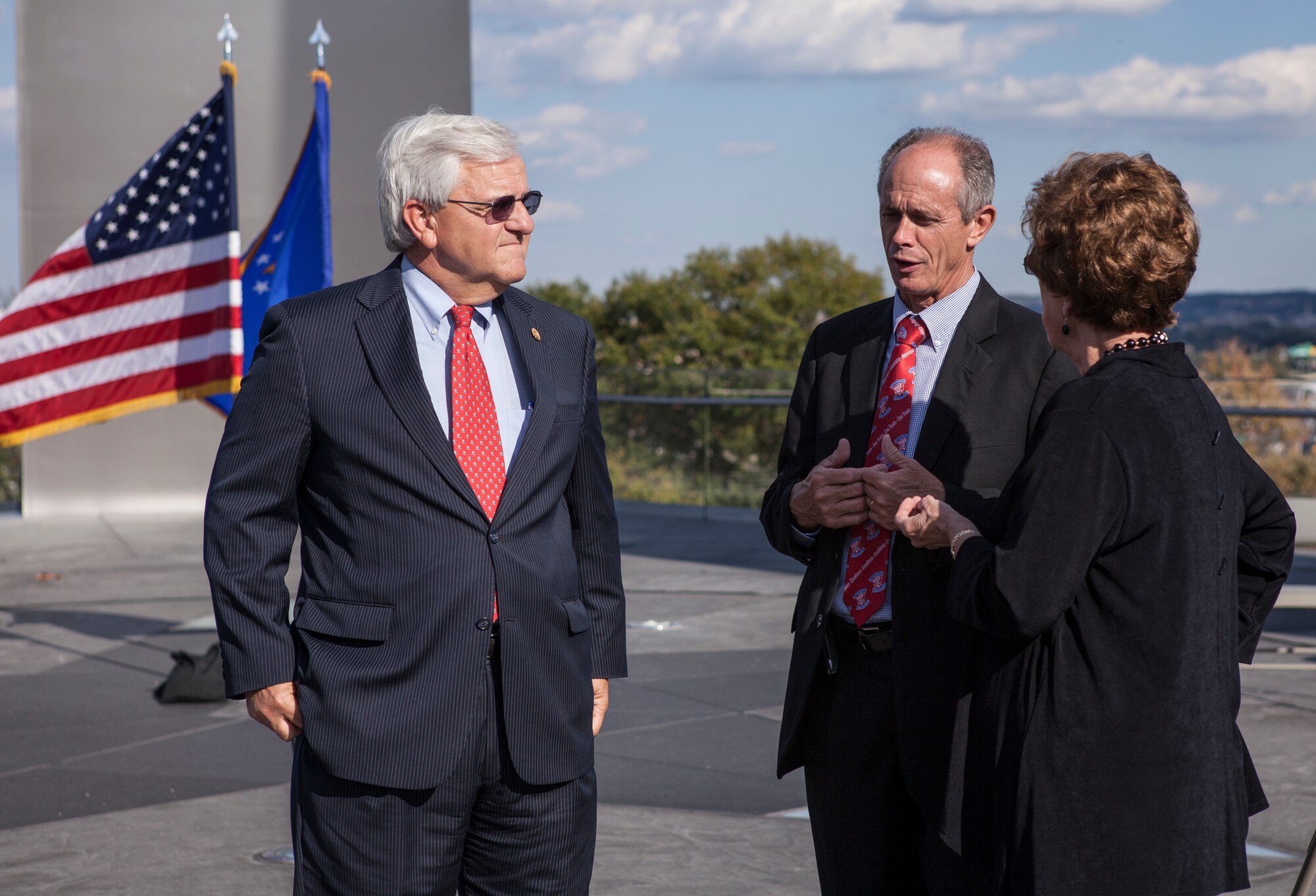Jacksonville, Ark. mayor Gary Fletcher speaks with Arkansas senators Jane English and Eddie Joe Williams at the Air Force Memorial Oct. 8, 2014, in Arlington, Virginia. The political figures made the trip to witness the 19th Airlift Wing at Little Rock Air Force Base, receive the Doolittle Award. (U.S. Air Force photo by Master Sgt. Tara Islas)