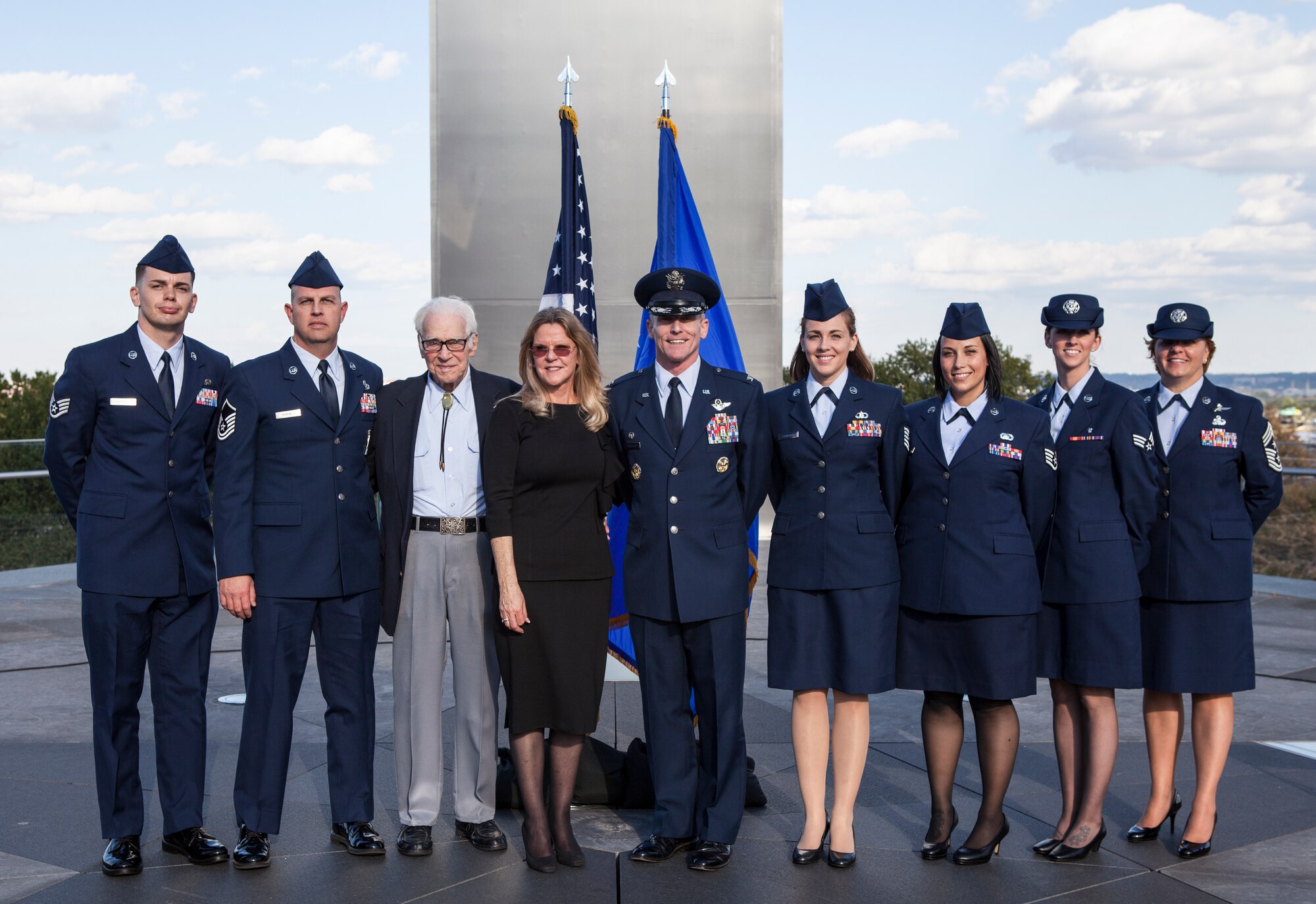 Col. Patrick Rhatigan, 19th Airlift Wing commander, and 19th AW Airmen accept the James H. “Jimmy” Doolittle Award from former 19th AW Commander, Brig. Gen. Greg Otey, at the Air Force Memorial Oct. 8, 2014, in Arlington, Virginia. The Doolittle Award recognizes a unit that has displayed bravery, determination, discipline, "esprit de corps" and superior management of joint operations in multiple conflicts. (U.S. Air Force photo by Master Sgt. Tara Islas)