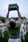 Cpl. Rashard Howe lifts an ammunition can during the annual Combat Fitness Test. 