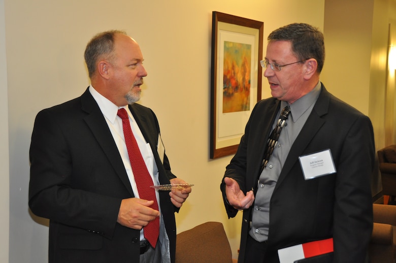 WINCHESTER, Va. - Neal Thibault, Middle East District chief of construction branch, speaks to an attendee during the Middle East District Industry Day Oct. 16 in Winchester, Va. 