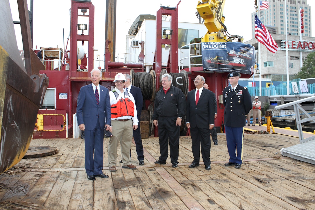 Vice President Joe Biden toured ongoing Delaware River Main Channel Deepening operations in Philadelphia on Oct. 16. Great Lakes Dredge & Dock Company Project Manager Brian Puckett, Congressman Robert Brady, Congressman Chaka Fattah and Philadelphia District U.S. Army Corps of Engineers Commander Lt. Col. Michael Bliss are pictured left to right.