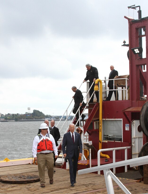 Great Lakes Dredge & Dock Company Project Manager Brian Puckett explains dredging operations to Vice President Joe Biden, Senator Bob Casey, Congressman Bob Brady and Congressman Chaka Fattah during an Oct 16 event. Leaders were briefed on the Delaware River Main Channel Deepening Project and toured the Dredge 54 at Penn's Landing in Philadelphia.
