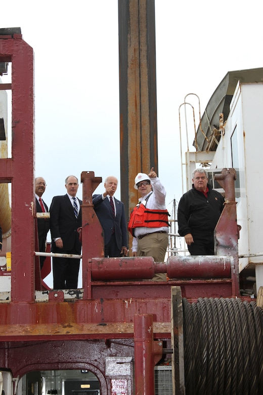 Great Lakes Dredge & Dock Company Project Manager Brian Puckett explains dredging operations to Vice President Joe Biden, Senator Bob Casey, Congressman Bob Brady and Congressman Chaka Fattah during an Oct 16 event. Leaders were briefed on the Delaware River Main Channel Deepening Project and toured the Dredge 54 at Penn's Landing in Philadelphia.