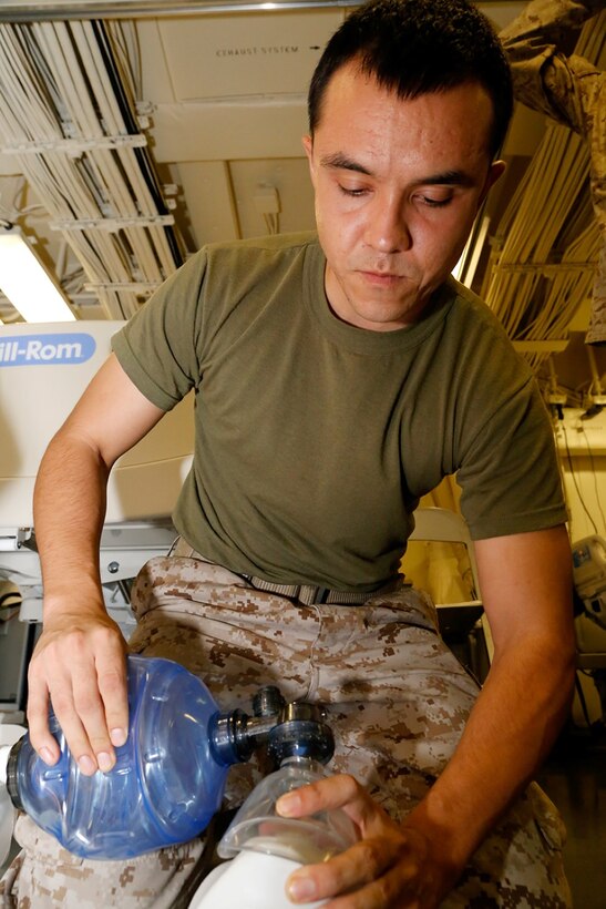 U.S. Marine Corps Sgt. Daniel M. Soto, a joint fires observer with the 1st Air Naval Gunfire Liaison Company detachment, 11th Marine Expeditionary Unit (MEU), and native of Santa Cruz, California, practices cardio pulmonary resuscitation (CPR) techniques during a basic life support class aboard the USS San Diego (LPD 22), Oct. 13. The 11th MEU is embarked with the Makin Island Amphibious Ready Group and deployed to maintain regional security in the U.S. 5th Fleet area of responsibility. (U.S. Marine Corps photos by Gunnery Sgt. Rome M. Lazarus/Released)  