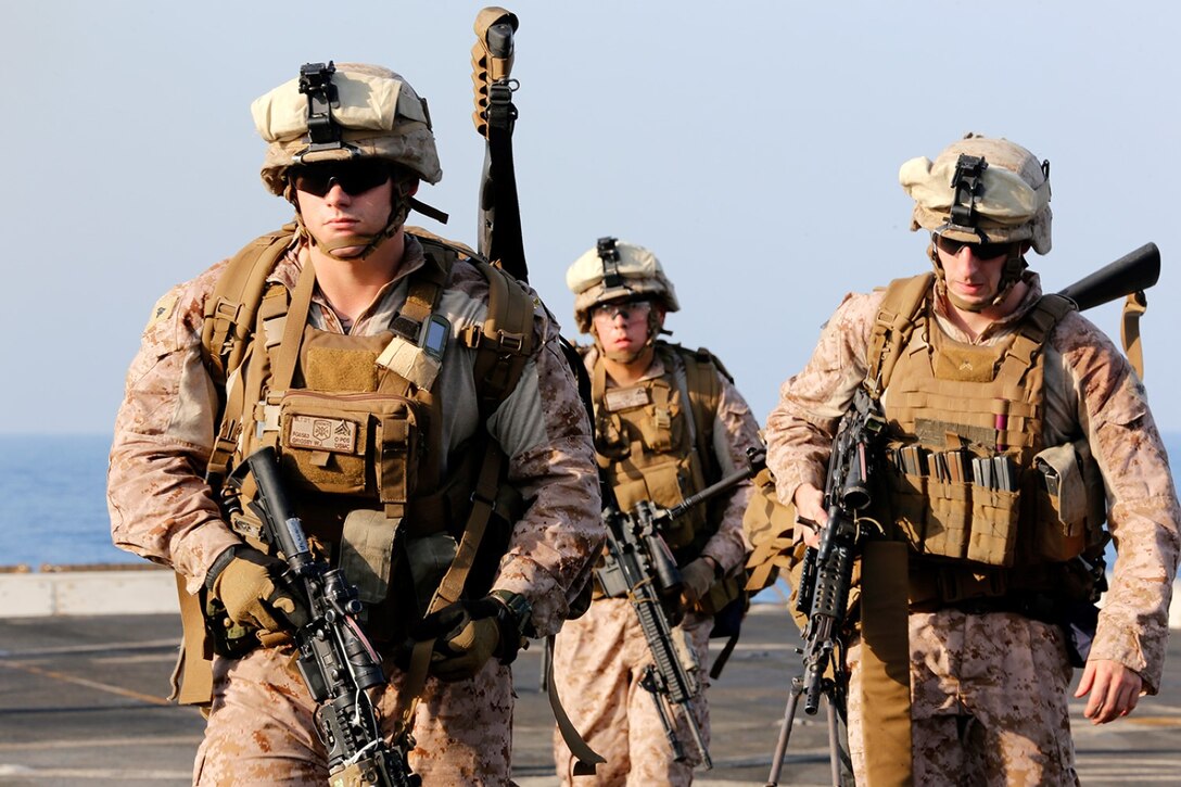 U.S. Marines with Battalion Landing Team 2nd Battalion, 1st Marines, 11th Marine Expeditionary Unit (MEU), disembark from a CH-53E Super Stallion from Marine Medium Tiltrotor Squadron 163 (Reinforced), 11th MEU, during a fast-rope exercise on the flight deck of the USS San Diego (LPD 22), Oct. 15. The 11th MEU is deployed with the Makin Island Amphibious Ready Group as a theater reserve and crisis response force throughout U.S. Central Command and the U.S. 5th Fleet area of responsibility. (U.S. Marine Corps photos by Gunnery Sgt. Rome M. Lazarus/Released)  