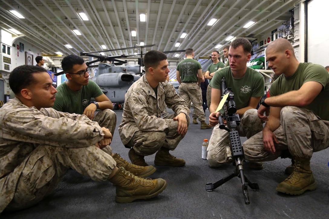 U.S. Marines with Charlie Battery, Battalion Landing Team 2nd Battalion, 1st Marines, 11th Marine Expeditionary Unit (MEU), perform weapons handling drills aboard the amphibious assault ship USS Makin Island (LHD 8), Oct. 15. The Makin Island Amphibious Ready Group (ARG) and embarked 11th MEU provides a versatile sea-based, expeditionary force that can be tailored to a variety of missions in the U.S. 5th Fleet area of responsibility.  (U.S. Marine Corps photo by Cpl. Laura Y. Raga/ RELEASED)