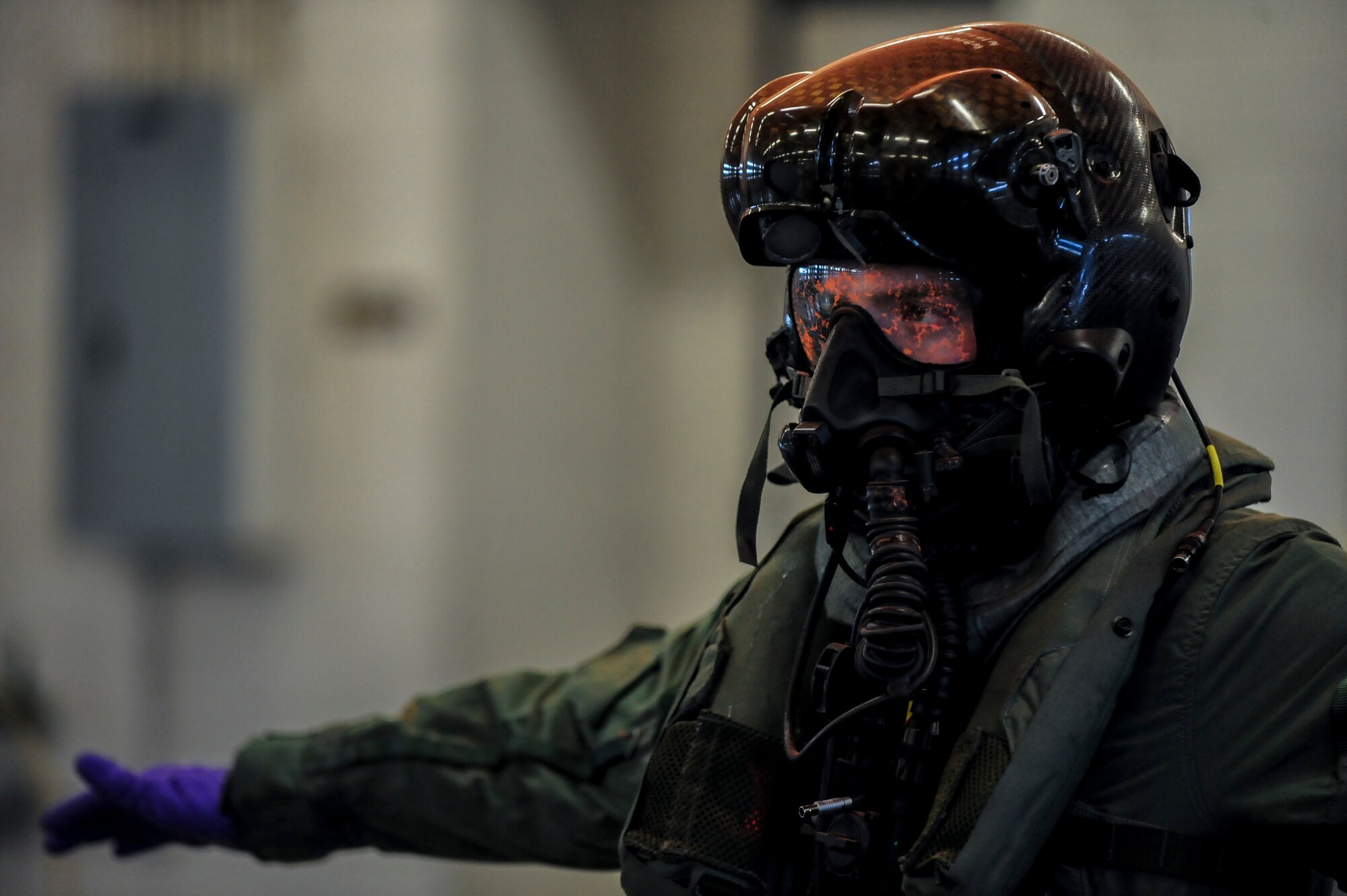 Airman 1st Class Kyle Rogers goes through decontamination procedures during an Air Combat Command Joint Aircrew Flight Equipment evaluation testing Oct. 14, 2014, at Seymour Johnson Air Force Base, N.C. Representatives from several bases were on hand to test current and future flight equipment for every aircraft in the Air Force inventory. Rogers is an aircrew flight equipment specialist assigned to the 355th Operations Support Squadron at Davis-Monthan Air Force Base, Ariz. (U.S. Air Force photo/Airman 1st Class Brittain Crolley)