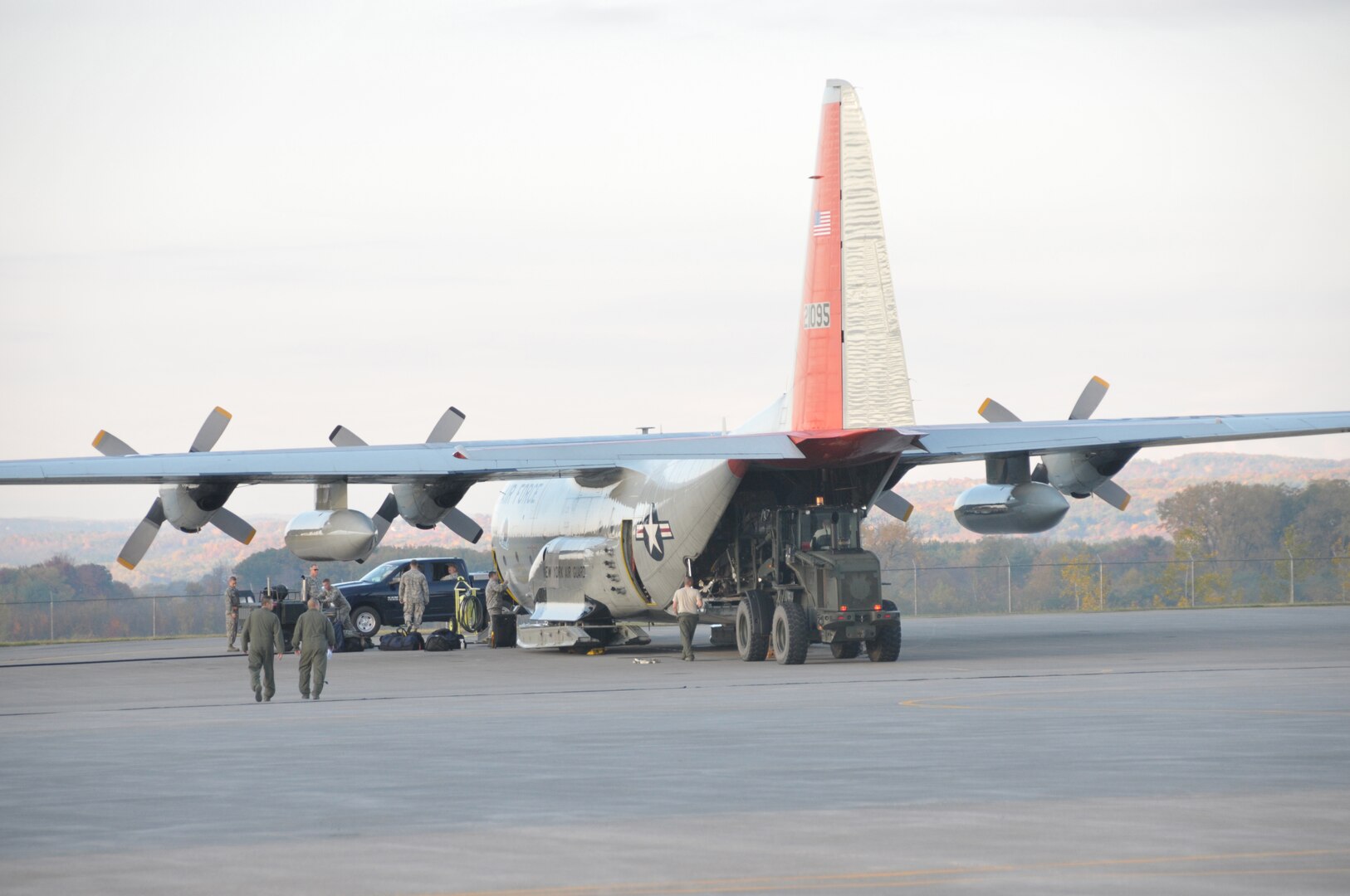 Airmen prep the first LC-130 Hercules headed to Antarctica. The aircraft and aircrew with the 109th Airlift Wing took off from Stratton Air National Guard Base, Scotia, New York, on Oct. 17, 2014. The aircraft is headed to Antarctica for the Wing's 27th year participating in Operation Deep Freeze in support of the National Science Foundation. The 109th AW boasts the U.S. military's only ski-equipped aircraft, which has been supporting the NSF's South Pole research since 1988. 