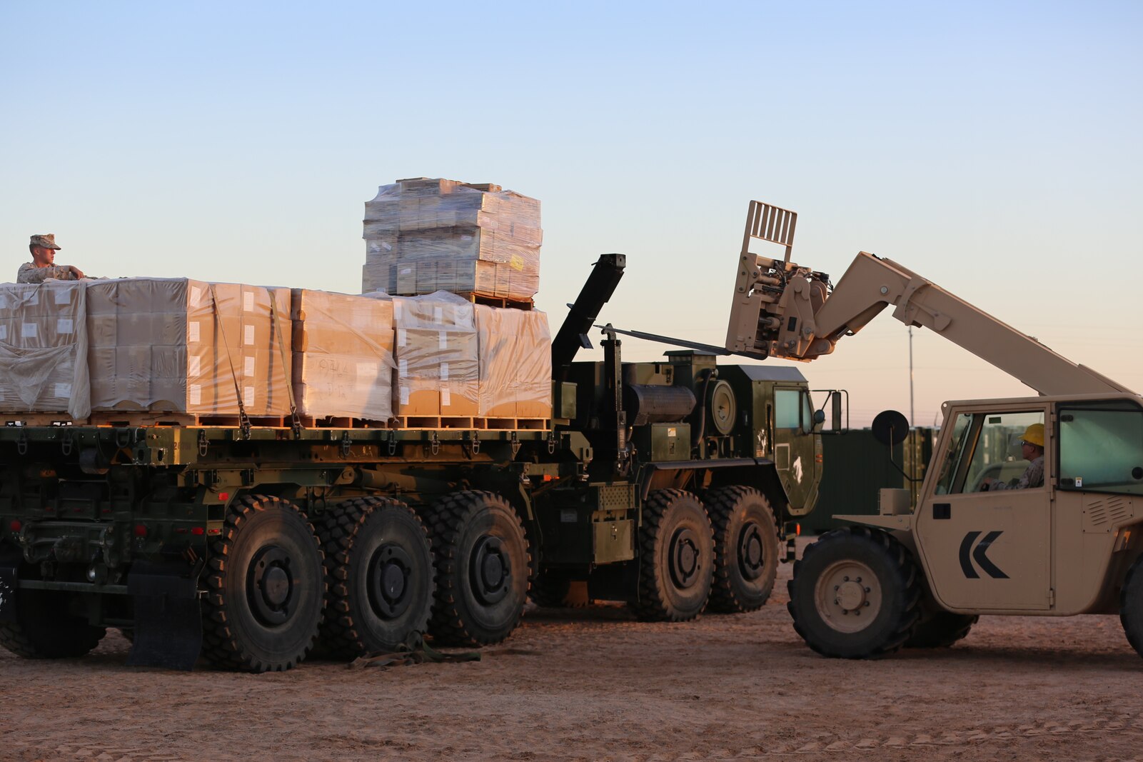 Marines with 1st Supply Battalion, Combat Logistics Regiment 15, 1st Marine Logistics Group, I Marine Expeditionary Force, provide logistical support for the Weapons and Tactics Instructor Course in Yuma, Ariz., Oct. 15, 2014. For more than a month, 1st Supply Bn. provided food, water, and other logistical services to the various forward operating bases where the WTI course Marines were operating.