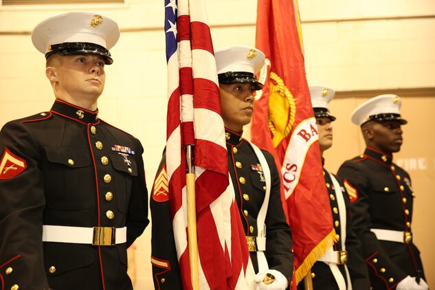 Lance Cpl. Alex Roberts, motor transport operator, Combat Logistics Battalion 7, Sgt. Equer Fierro, motor transportation operator, CLB-7, Cpl. Wesley Curfman, motor transportation operator, CLB-7, and Cpl. Kenyon Myers, motor transportation operator, CLB-7, prepare for the colors ceremony at the 5th Annual Veterans Expo at the Riverside County Fairgrounds in Indio, Calif., Oct. 11, 2014. The Combat Center provided the color guard to the expo.