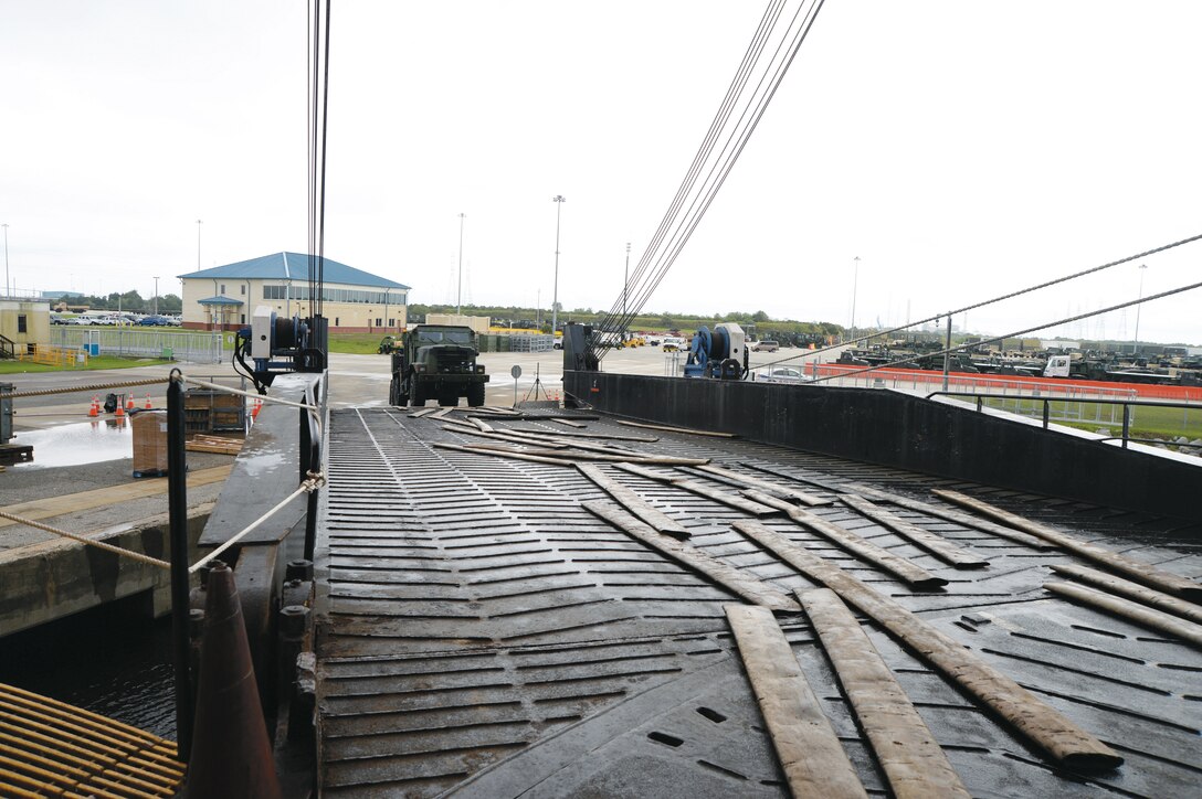 A truck is driven by a dockworker onto the USNS Pfc. Dewayne T. Williams. The vehicle was one of several loaded onto the vessel at Blount Island Command, Jacksonville, Fla., recently.