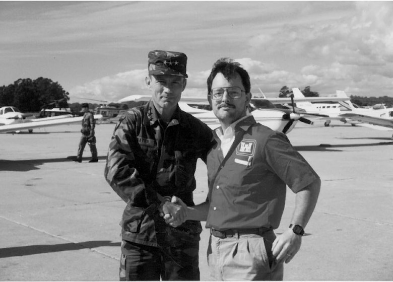 Joe Laird chased down the Chief of Engineers' chopper to get this photo with Lt. Gen. Henry Hatch in 1989 as he landed to survey the earthquake damage at Loma Prieta.