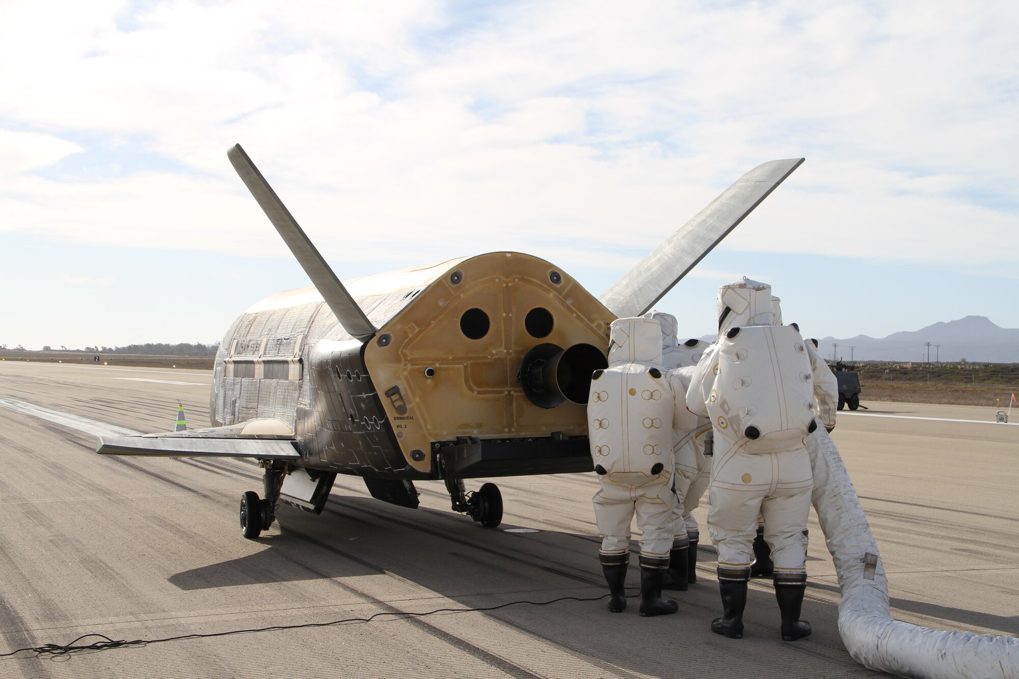 The X-37B Orbital Test Vehicle mission 3 (OTV-3), the Air Force's unmanned, reusable space plane, landed at Vandenberg Air Force Base at 9:24 a.m. Oct. 17, 2014. The OTV-3 conducted on-orbit experiments for 674 days during its mission, extending the total number of days spent on-orbit for the OTV program to 1367 days. The X-37B is the newest and most advanced re-entry spacecraft. Managed by the Air Force Rapid Capabilities Office, the X-37B program performs risk reduction, experimentation and concept of operations development for reusable space vehicle technologies. (Photo credit: Boeing)