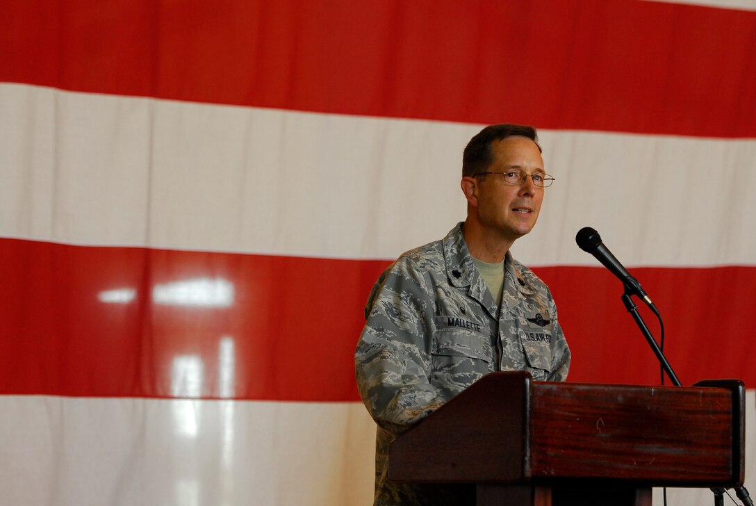 U.S. Air Force Lt. Col. Stephen Mallette, 145th Maintenance Group (MXG) commander, addresses a formation of 145th MXG Airmen about his dedication to them, the unit and its future during an assuming command ceremony held at the North Carolina Air National Guard Base, Charlotte Douglas Intl. Airport, Oct. 4, 2014. (U.S. Air National Guard photo by Staff Sgt. Julianne M. Showalter, 145th Public Affairs/Released)