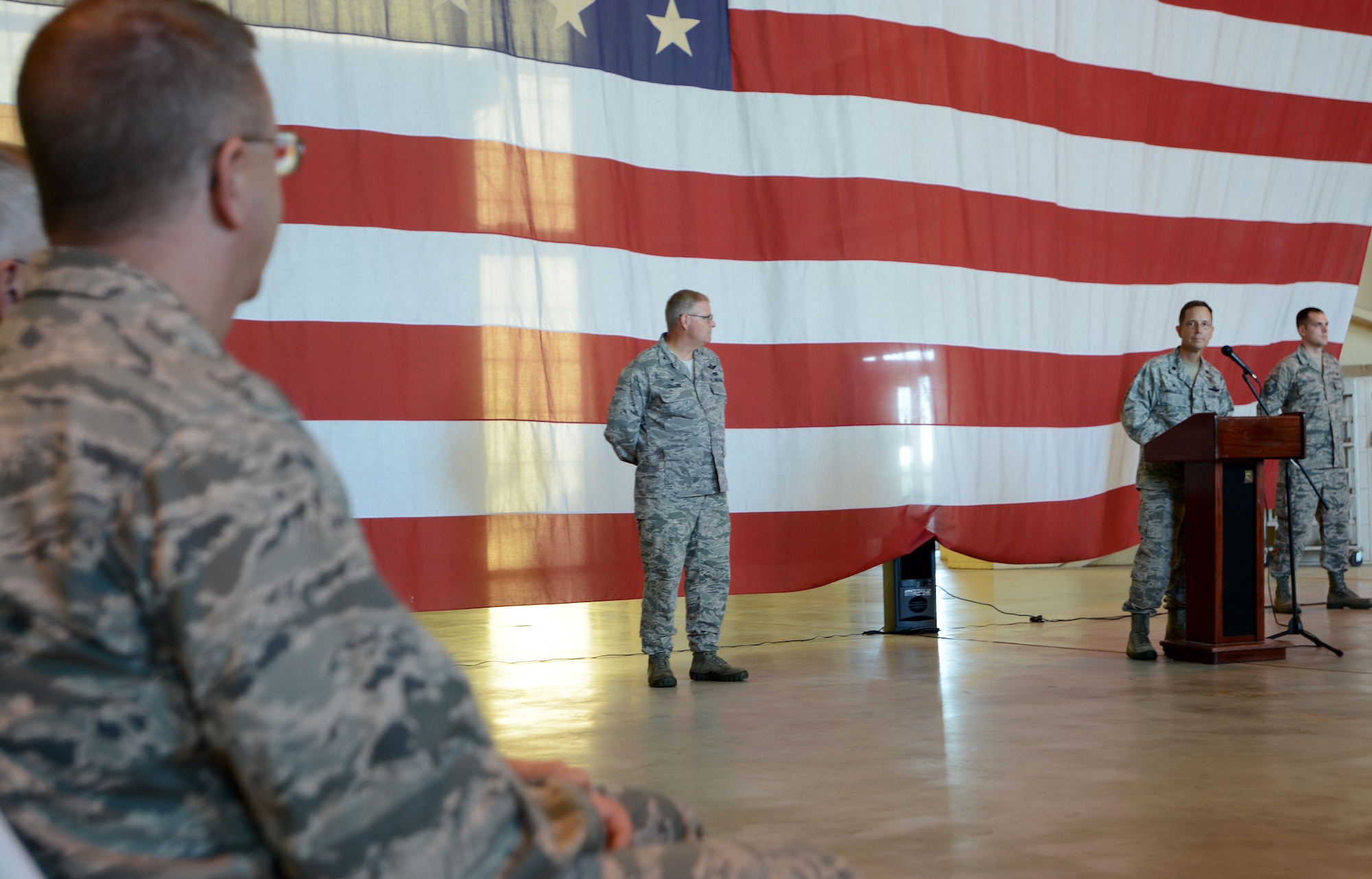 U.S. Air Force Brig. Gen. Roger E. Williams, Jr., North Carolina National Guard, Assistant Adjutant General for air operations, listens as Lt. Col. Stephen J. Mallette, delivers his introductory speech during an assumption of command ceremony held at the North Carolina Air National Guard base, Charlotte Douglas Intl. Airport. Mallette assumed command of the 145th Maintenance Group, October 4, 2014. (U.S. Air National Guard photo by Senior Airman Laura Montgomery, 145th Public Affairs /Released)