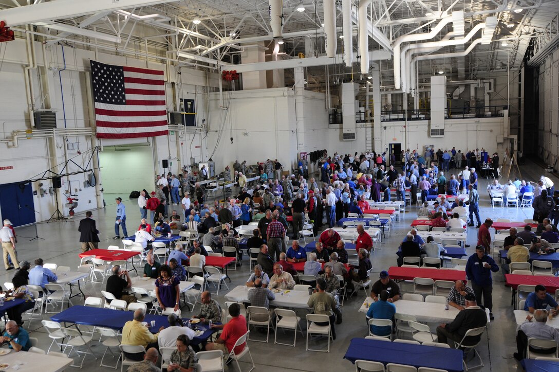 145th Airlift Wing’s Chiefs’ Council hosted the 2014 Retiree Breakfast inside a hanger at the North Carolina Air National Guard base, Charlotte Douglas Intl. Airport, October 3, 2014. This annual tradition is held to honor retired men and women who have served in the North Carolina Air National Guard. Military service is known for building camaraderie amongst servicemen and women, a fact evident by the attendance of more than 475 veterans’ that participated in this year’s 19th Annual Retiree Breakfast.  (U.S. Air National Guard photos by Master Sgt. Patricia F. Moran, 145th Public Affairs/Released)