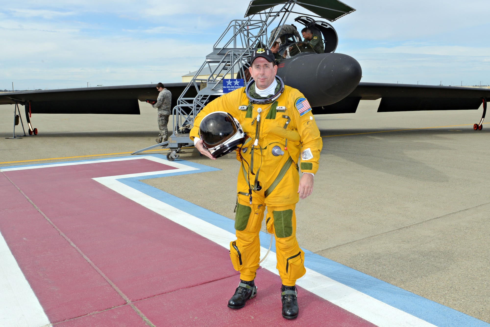 Maj. Gen. John Shanahan, 25th Air Force commander, poses in front of a U-2 Dragon Lady after receiving a flight at Beale Air Force Base, Calif., Oct. 17, 2014. Shanahan and Chief Master Sgt. Roger Towberman, 25th AF command chief, visited Beale for the first time since the Sept. 29 re-alignment of the 9th Reconnaissance Wing to the 25th AF.  (U.S Air Force photo by John Schwab/Released)