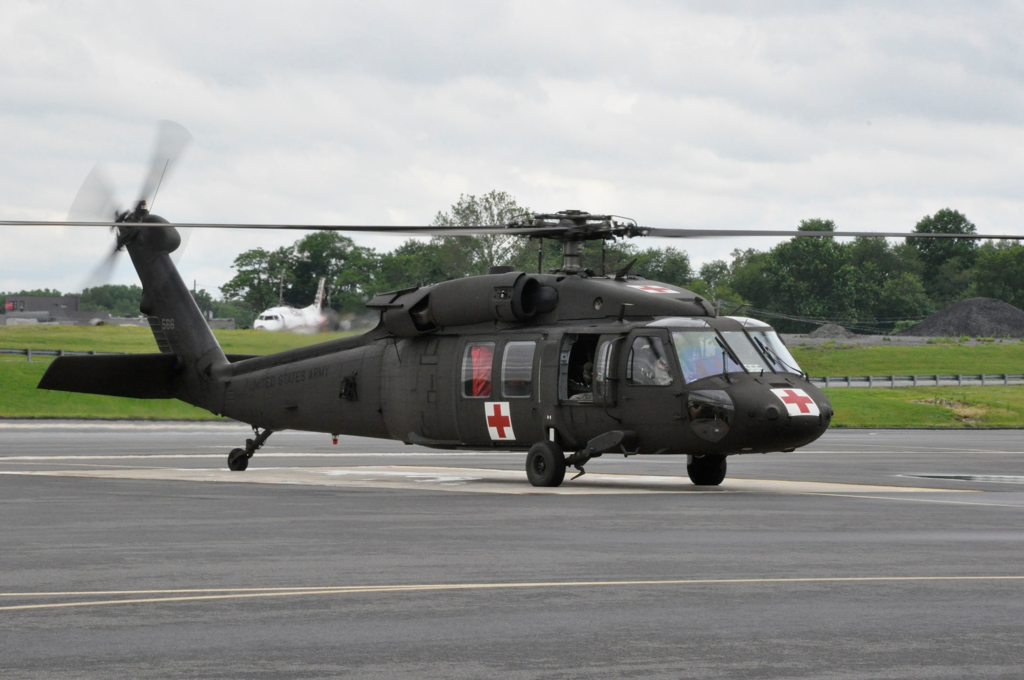 Soldiers from Detachment 1 F Company 1/126th Aviation, Delaware Army National Guard leave from the New Castle Airport, Del. for Fort Hood, Texas, in a UH-60 Black Hawk helicopter on June 5, 2014. The detachment will be at Fort Hood for four to six weeks before heading to Southwest Asia. (U.S. Army National Guard photo by Officer Candidate Wendy McDougall)