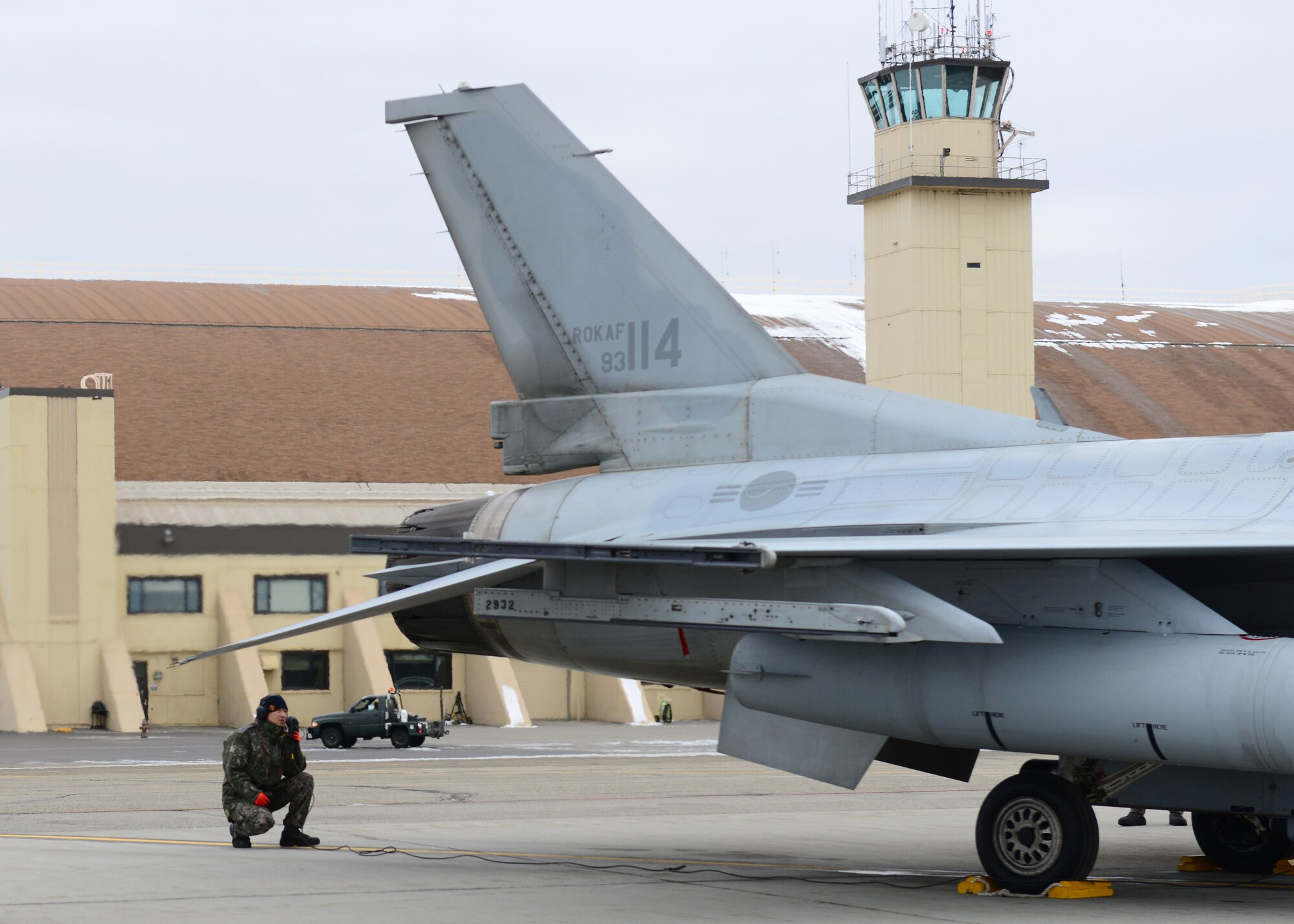 Republic of Korea air force Master Sgt. Young Kwang Kim, a crew chief assigned to the 120th Aircraft Maintenance Flight, performs a pre-flight inspection of a KF-16D Fighting Falcon fighter aircraftbefore a sortie at Eielson Air Force Base, Alaska, Oct. 15, 2014, during RED FLAG-Alaska 15-1. RF-A is a series of Pacific Air Forces commander-directed field training exercises for U.S. and partner nation forces, providing combined offensive counter-air, interdiction, close air support and large force employment training in a simulated combat environment. (U.S. Air Force photo by Senior Airman Ashley Nicole Taylor/Released)