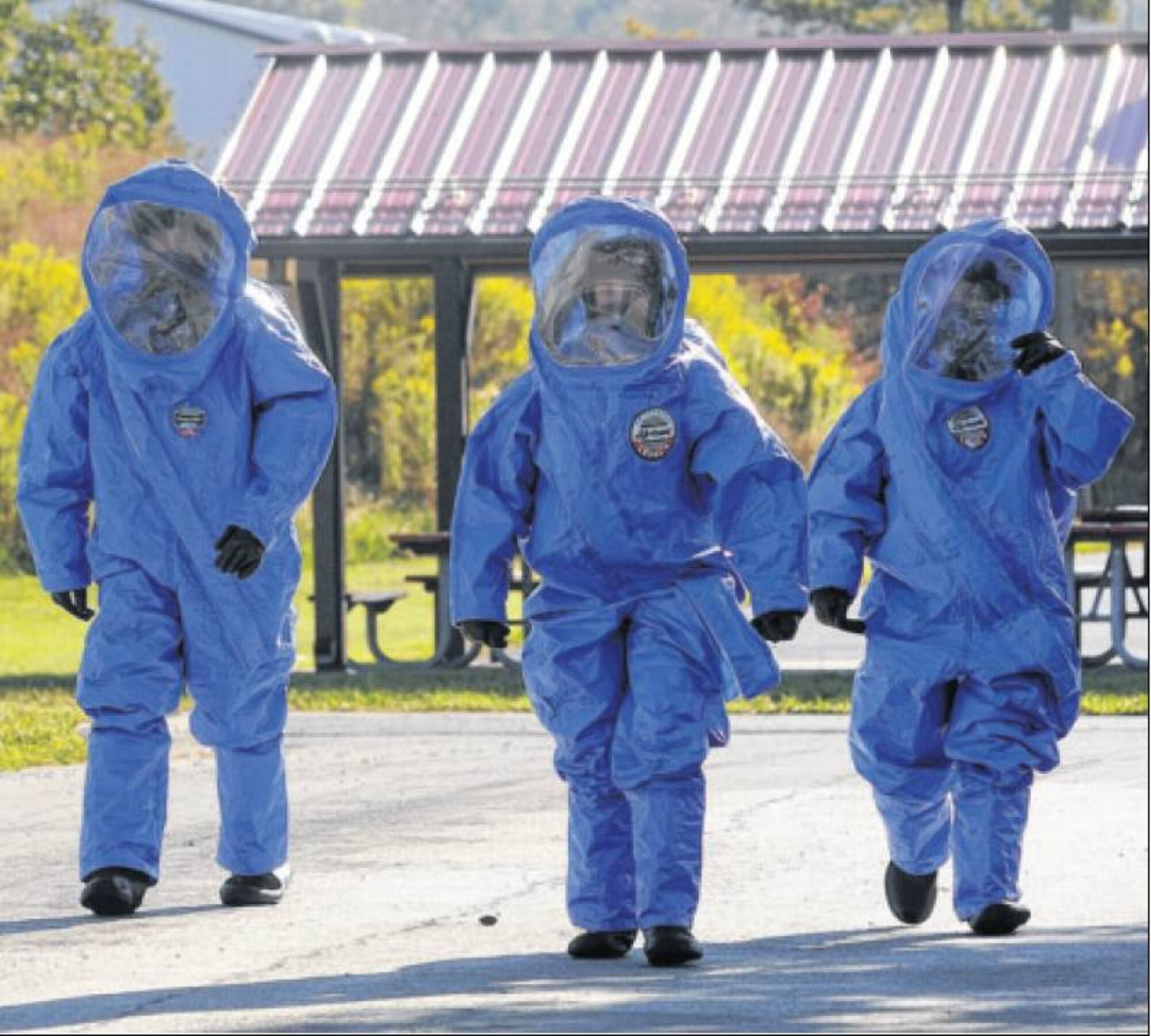 Wearing Level A suits, bioenvironmental engineering students respond to a simulated hazardous material response scenario at the Ohio Firce Academt. (Air Force photo)