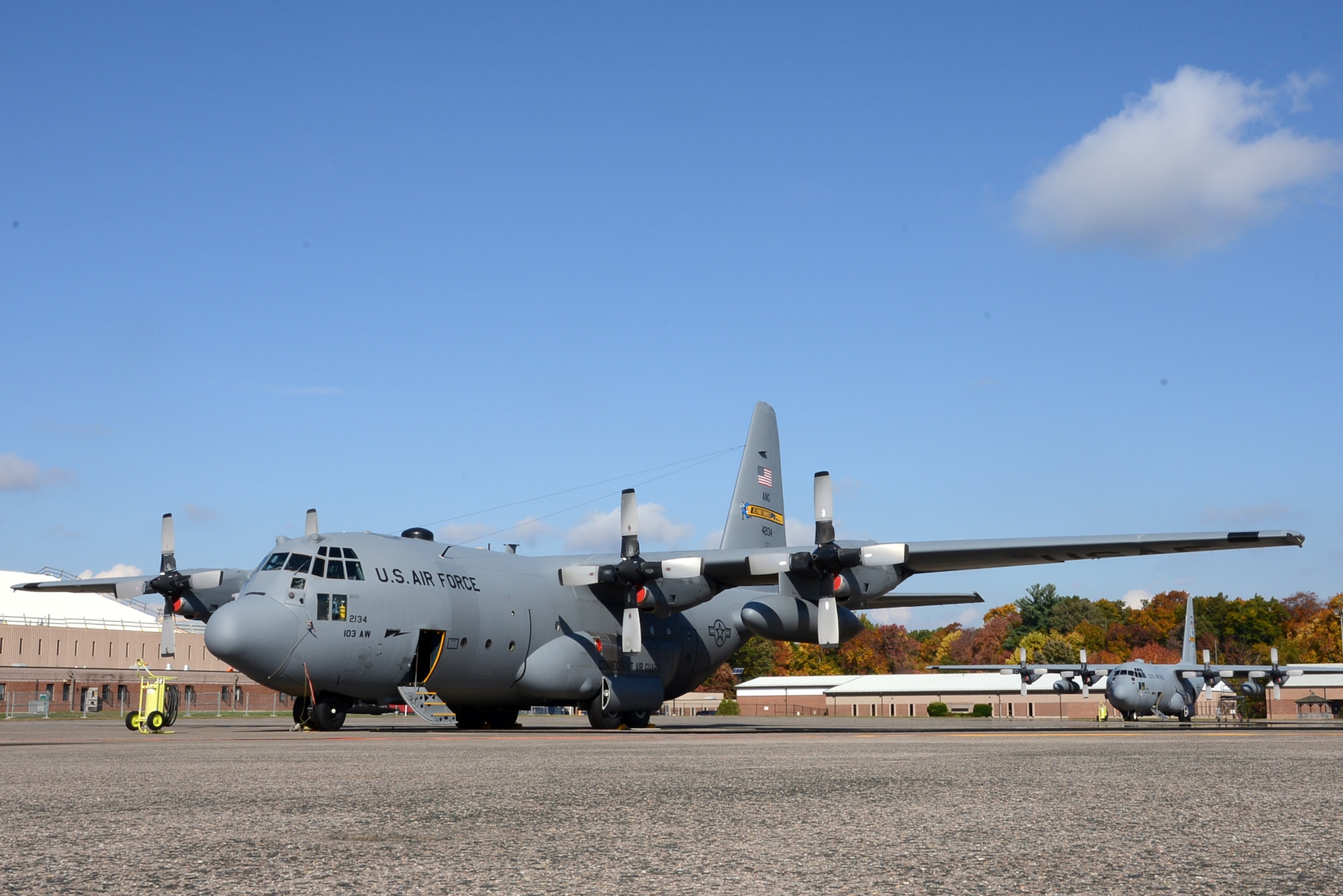 One year after the arrival of the first C-130H Hercules aircraft at Bradley Air National Guard Base, East Granby, Conn., a full fleet of aircraft adds color to the fall flightline, Friday, October 17, 2014.  The Flying Yankees' acceptance of the final of eight aircraft assigned to the 103rd Airlift Wing, Wednesday, October 15, 2014, marks an important milestone in the unit's conversion to the C-130 mission.  (U.S. Air National Guard photo by Master Sgt Erin McNamara)