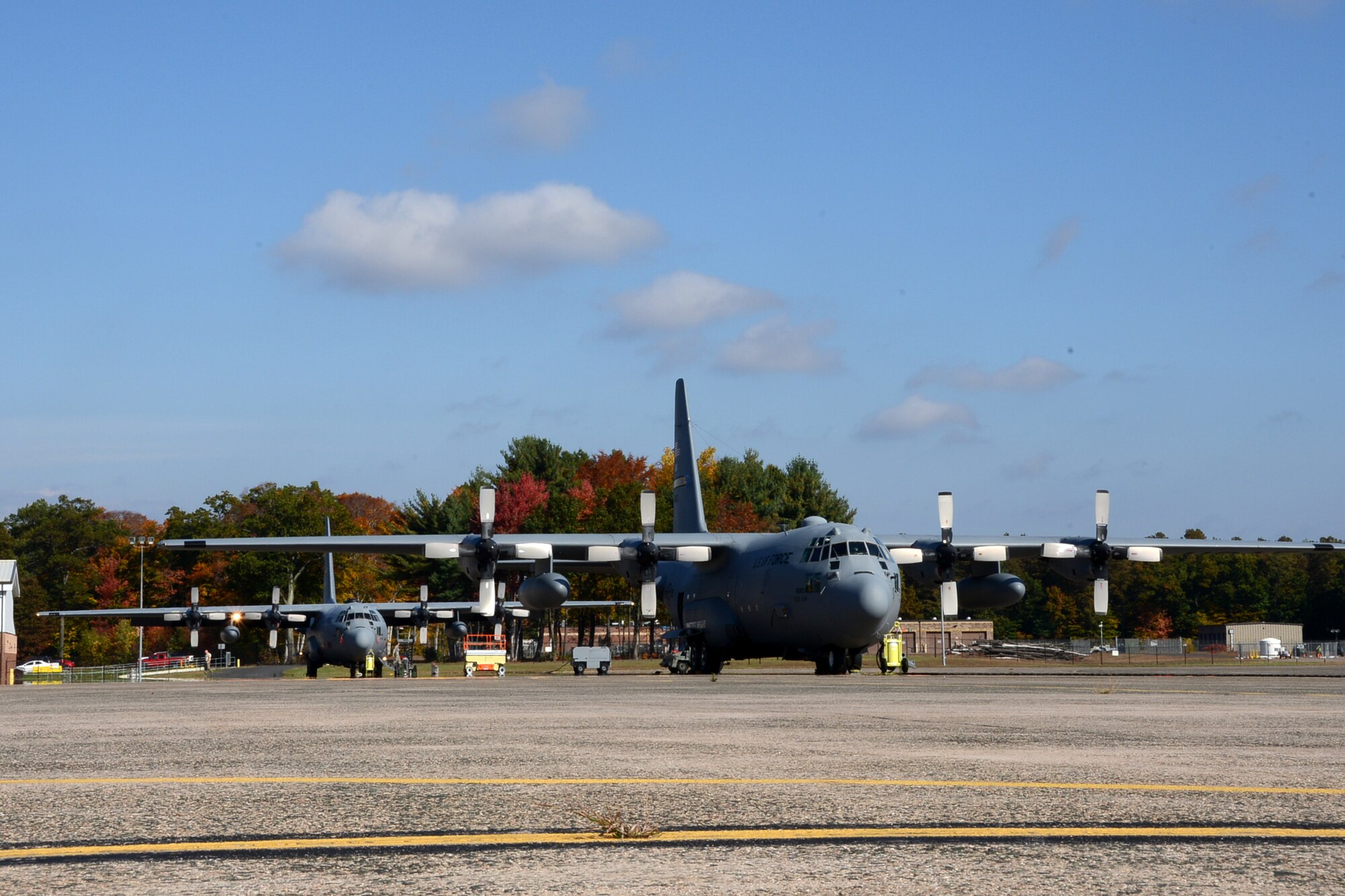 One year after the arrival of the first C-130H Hercules aircraft at Bradley Air National Guard Base, East Granby, Conn., a full fleet of aircraft adds color to the fall flightline, Friday, October 17, 2014.  The Flying Yankees' acceptance of the final of eight aircraft assigned to the 103rd Airlift Wing, Wednesday, October 15, 2014, marks an important milestone in the unit's conversion to the C-130 mission.  (U.S. Air National Guard photo by Master Sgt Erin McNamara)