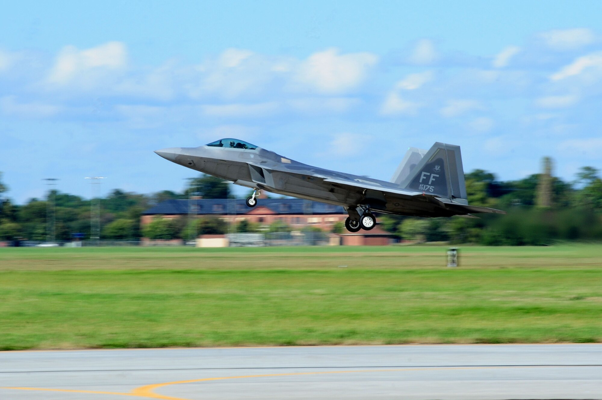 An F-22 Raptor from the 94th Fighter Squadron takes off during an exercise at Langley Air Force Base, Va., Oct. 16, 2014. The exercise evaluated the proficiency of members assigned to the 1st and 192nd Fighter Wings to be able to launch and retrieve aircraft. (U.S. Air Force photo by Airman 1st Class Areca T. Wilson/Released)