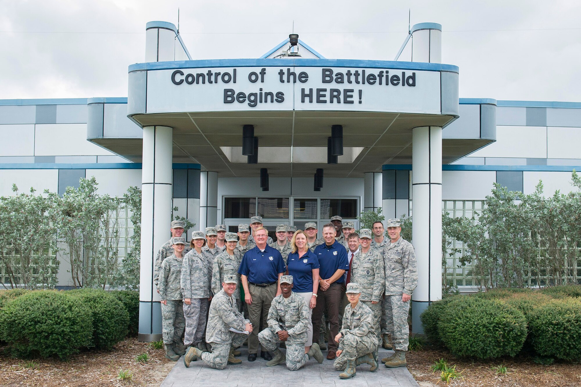 Secretary of the Air Force Deborah Lee James and Team Patrick-Cape members pose for a photo outside of the Morrell Operations Center during a visit to Cape Canaveral Air Force Station, Fla., Oct. 15, 2014.  The daylong visit included tours of Air Force Eastern Range launch assets as well as a windshield tour of NASA’s Kennedy Space Center. (U.S. Air Force photo/Matthew Jurgens)