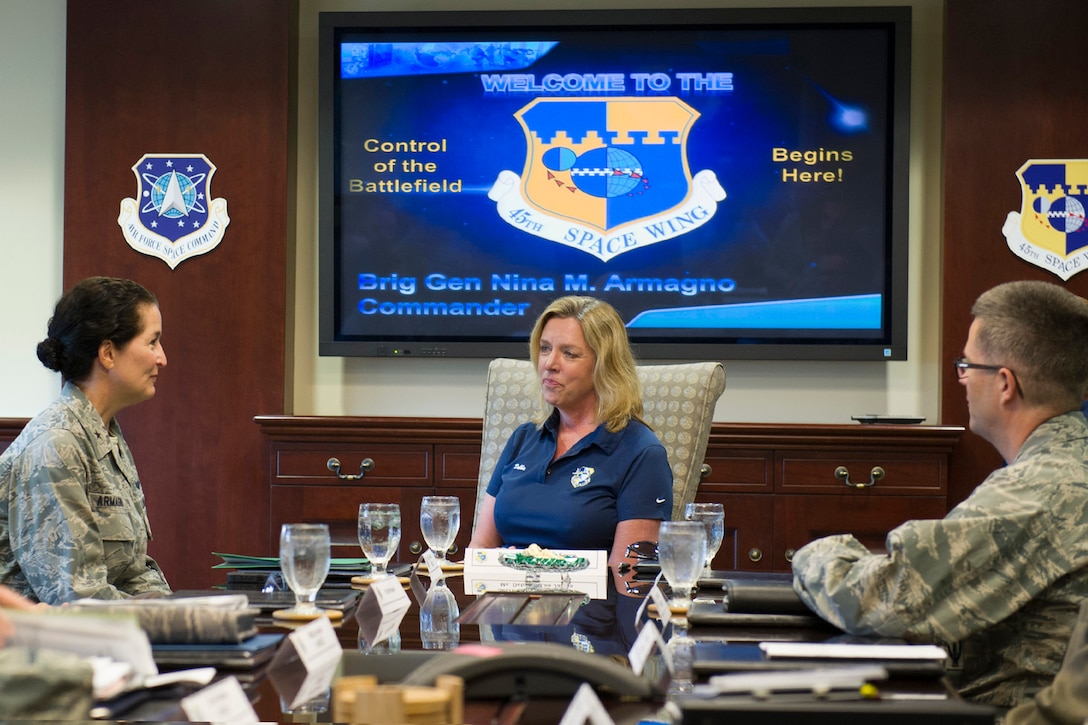 Secretary of the Air Force Deborah Lee James receives the wing mission briefing from Brig. Gen. Nina Armagno, 45th Space Wing commander, and Col. Shawn Fairhurst, 45th Space Wing vice commander, during a visit to Patrick Air Force Base and Cape Canaveral Air Force Station, Fla., Oct. 15, 2014. The daylong visit included tours of Air Force Eastern Range launch assets as well as a windshield tour of NASA’s Kennedy Space Center. (U.S. Air Force photo/Matthew Jurgens)
