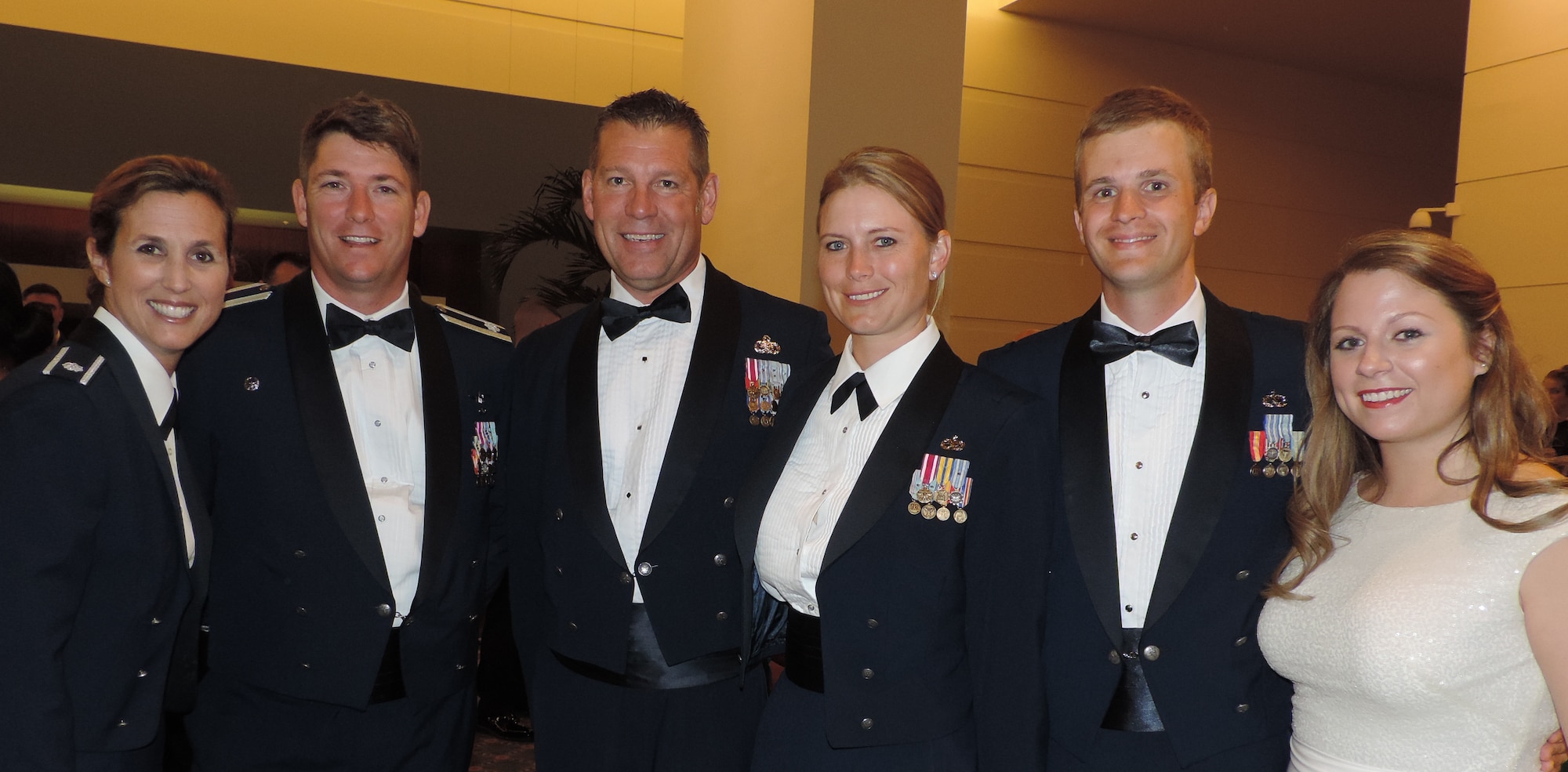 Lt. Col. Loralie E. Rasmussen, ANG advisor to commander Spaatz Center, Lt. Col. Reid F. Rasmussen, academy of military science commander, Master Sgt. Michael Wajer, and Officer Candidate Tammy Wajer, 120th Fighter Wing Great Falls, Mont., Officer Candidate Scott Himes and Shannon Himes, 118th Airlift Wing, Tenn. They were attending the Air National Guard’s Academy of Military Science’s Dining Out at Maxwell Air Force Base, Ala.  (Air National Guard photo by Col. Nahaku A. McFadden)