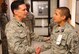 Senior Airman David Callejas, 4th Aerospace Medicine Squadron public health technician, greets Brig Gen. (Dr.) Sean Murphy, the command surgeon at Air Combat Command, during an orientation tour of the 4th Medical Group on Oct. 17, 2014, at Seymour Johnson North Carolina. Murphy took the time to interact with the Airmen assigned to the 4th MDG and received several briefings on future upgrades to the facility. (U.S. Air Force photo/Airman 1st Class Brittain Crolley)