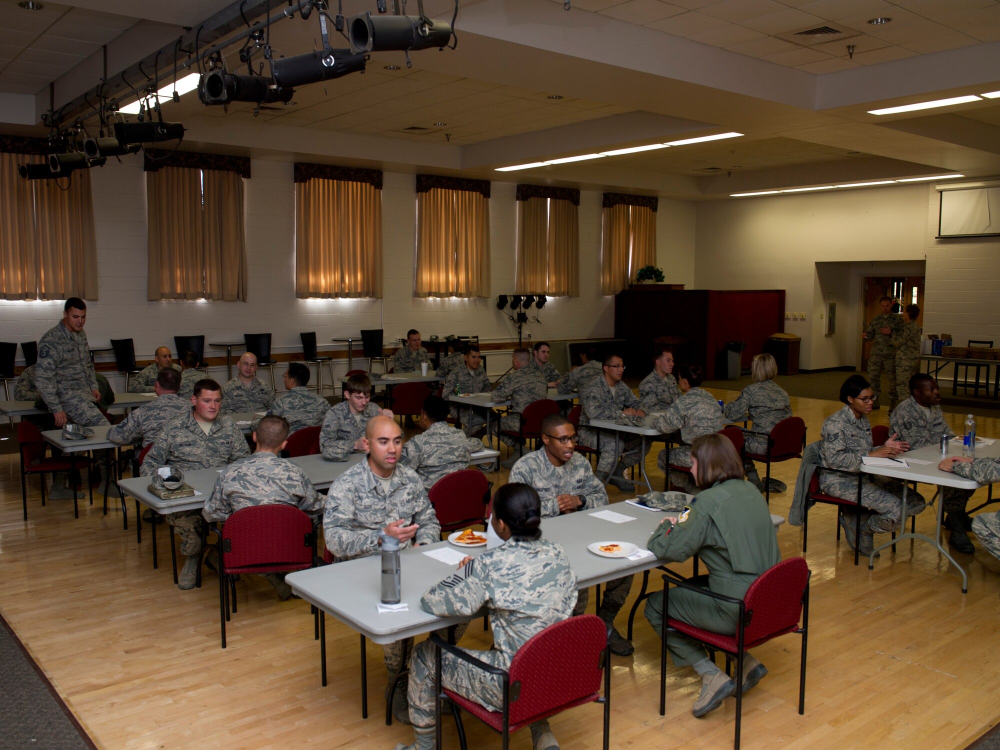 Members of Team Holloman participate in Speed Mentoring in the Community Activity Center at Holloman Air Force Base, N.M., Oct. 14. The event was sponsored by the Holloman Middle Two organization and brought together junior airmen, Non-Commissioned Officers and senior leadership to share their personal Air Force experiences and to discuss the airmen’s career goals. The timed event allowed airman to spend three minutes in a one-on-one session with a senior mentor, then move on to the next mentor. “Any opportunity our folks have to talk to senior leadership is important,” said Col. Robert Kiebler, 49th Wing commander. “It gives them not just insight on leadership techniques, but also how they look at the Air Force and its core values.” The event demonstrates to airman the support to attain a successful career is always at their disposal. The Holloman Middle Two origination is a professional group open to all Air Force staff and technical sergeants assigned to Holloman. (U.S. Air Force photo by Senior Airman Leah Ferrante/Released) 