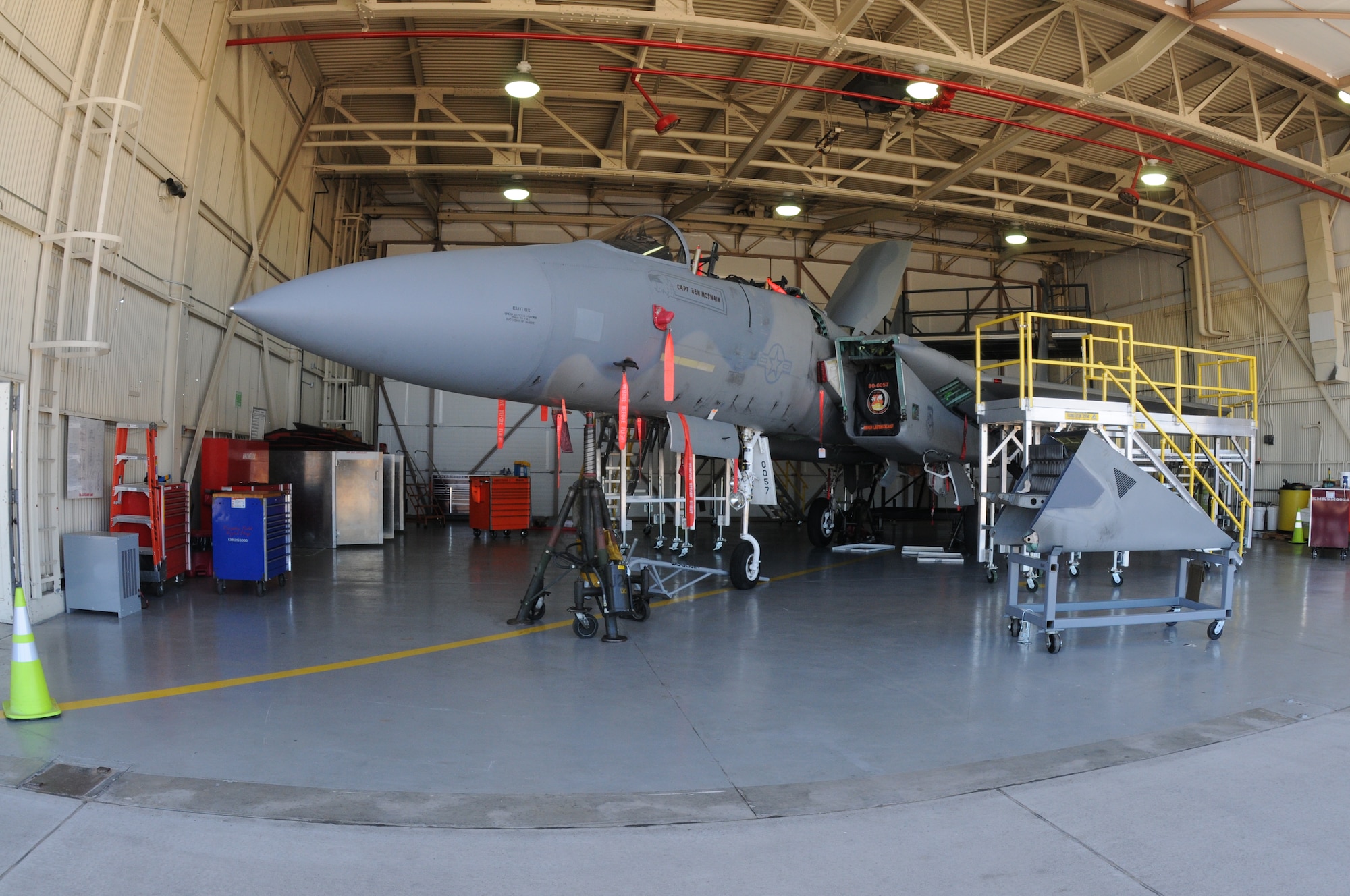 An Oregon Air National Guard F-15 Eagle from the 173rd Fighter Wing is almost unrecognizable as a fighter aircraft with multiple pieces missing from its body while sitting in the hangar at Kingsley Field, in Klamath Falls, Ore. Oct. 16, 2014.  This aircraft is going through phase maintenance where the 173rd FW maintainers closely inspect the aircraft for cracks and other types of damage, verifying that the 30 plus year old aircraft is safe to fly.  (U.S. Air National Guard photo by Master Sgt. Jennifer Shirar/Released)  