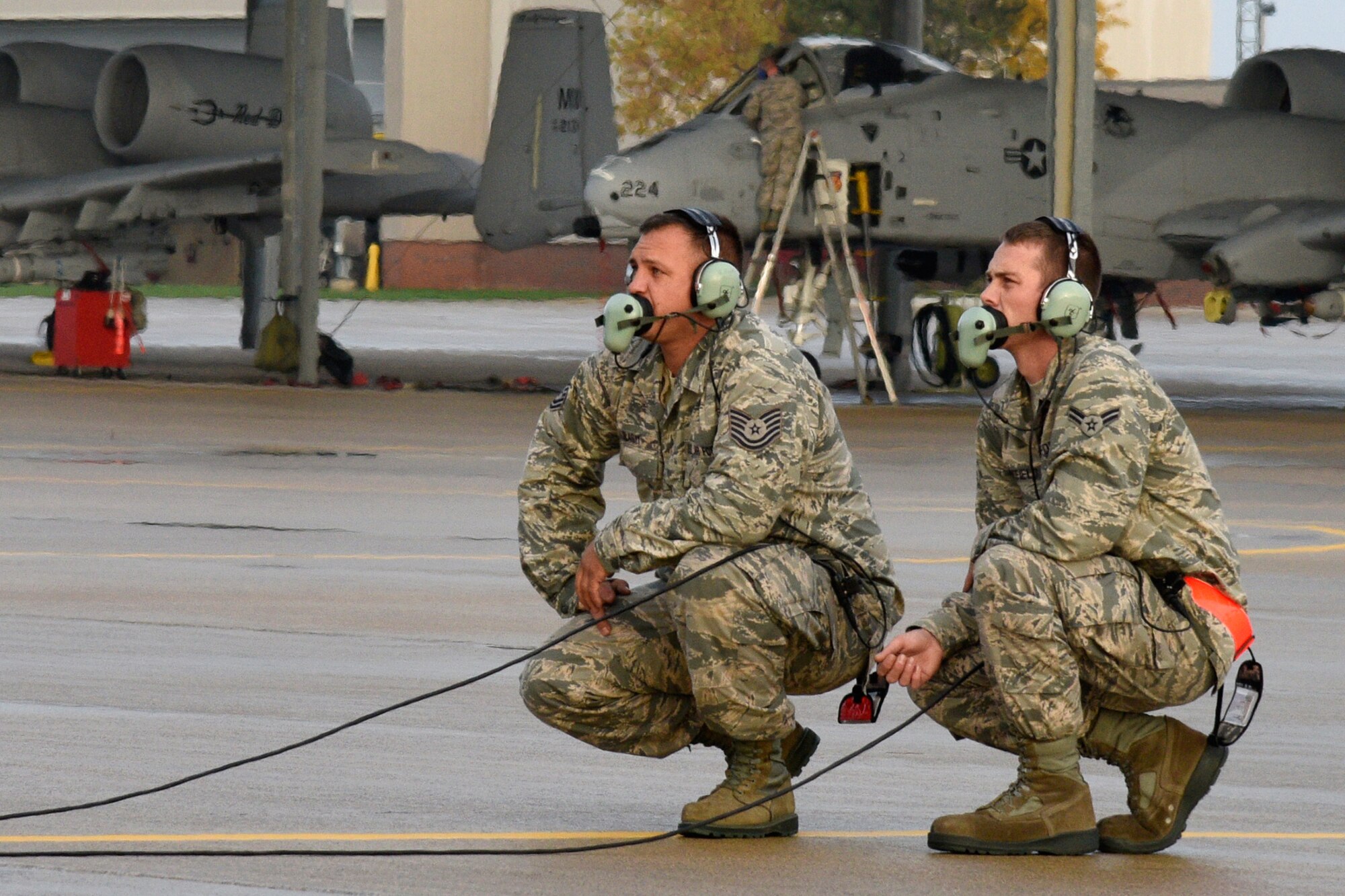 127th Aircraft Maintenance Squadron crew chief Tech Sgt Byron Blasky and Airman 1st Class Brian Whitfield, a crew chief in training, prepare to launch an A-10 Thunderbolt II for a routine training mission at Selfridge Air National Guard Base, Mich. on October 15, 2014. (Air National Guard Photo by Terry Atwell)