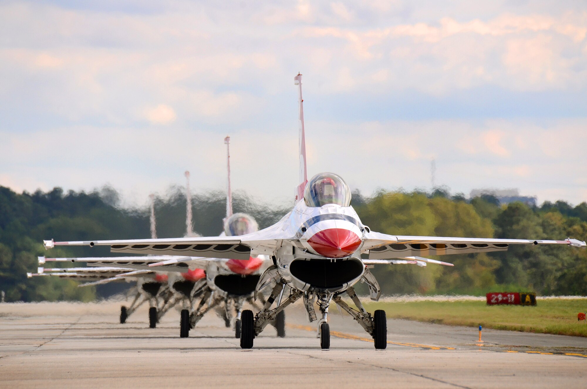 Thunderbird #1, the boss, leads the final three aircraft to their parking spots at Dobbins Air Reserve Base, Ga., Oct. 16, 2014. The U.S. Air Force Air Demonstration Squadron Thunderbirds will be performing this weekend at the Russell Regional Airport in Rome, Ga. (U.S. Air Force photo/Brad Fallin/Released)