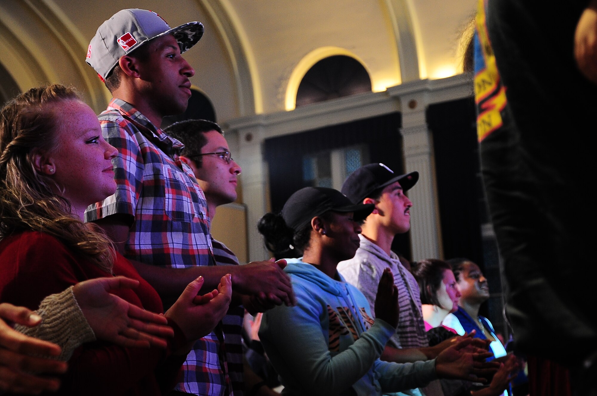 Airmen from Columbus Air Force Base dance and clap along to a song at the Tops In Blue performance Oct. 14 at the Mississippi University for Women’s Whitfield Hall. The performance had over 1,000 Airmen and local community members come out and see the show. (U.S. Air Force Photo/Airman John Day)