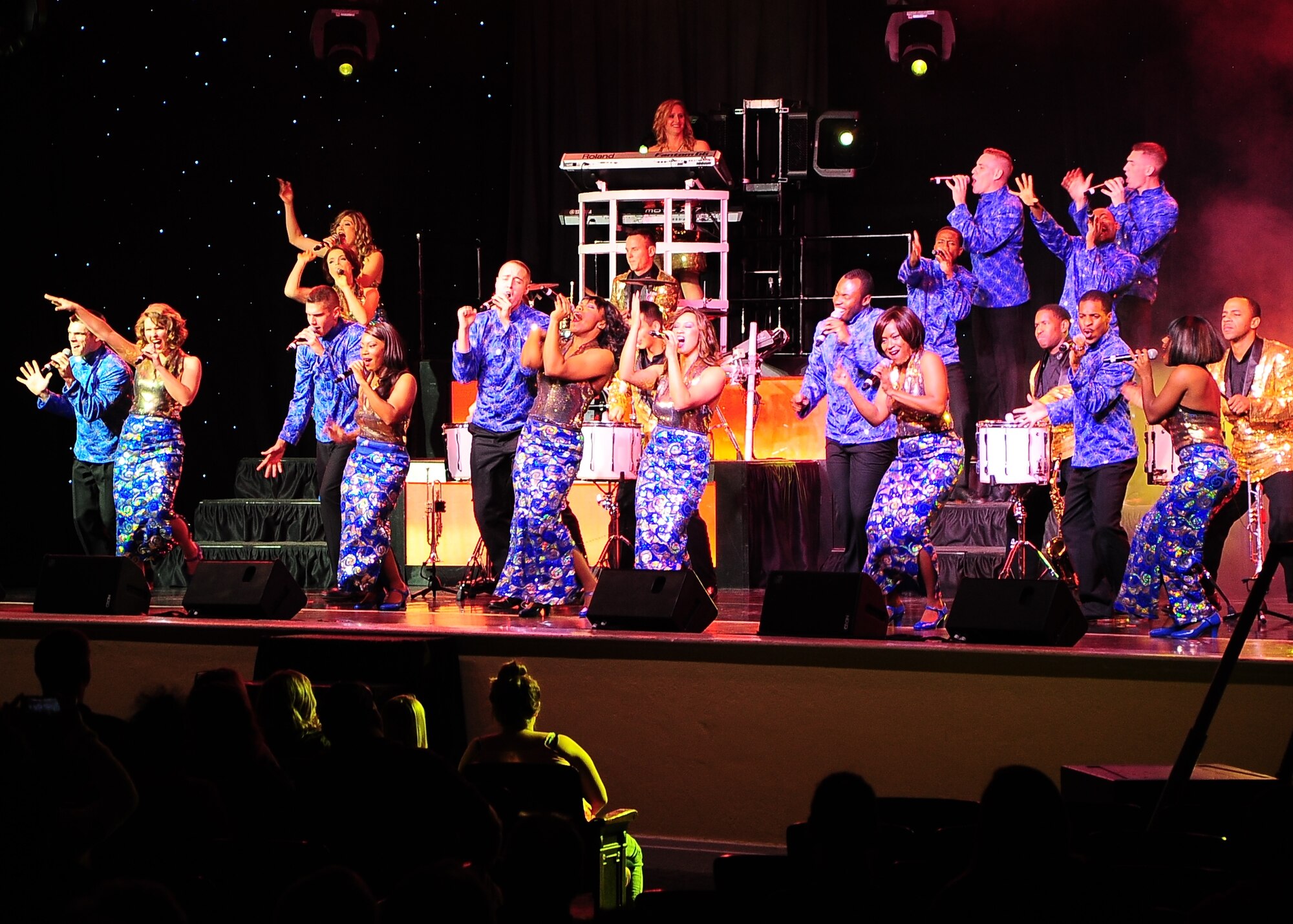 The Tops In Blue cast performs for Airmen from Columbus Air Force Base and members of the local community Oct. 14 at the Mississippi University for Women’s Whitfield Hall. This year, Tops In Blue celebrated 60 years of tradition by playing music from past decades along with popular music played today. (U.S. Air Force Photo/Airman John Day)