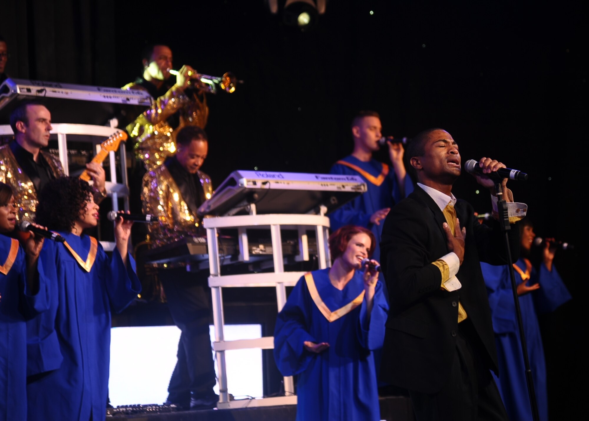Senior Airman Charles Cooper, Tops In Blue vocalist, sings during his solo performance during the Tops In Blue performance Oct. 14 at Mississippi University for Women’s Whitfield Hall. Tops In Blue performances are designed for all ages. Pop, Country, Jazz, R&B, Patriotic, Gospel, Contemporary Christian, Children’s, Top 100 and Nostalgia are all genres that are performed by the Tops In Blue cast. (U.S. Air Force Photo/Airman Daniel Lile)