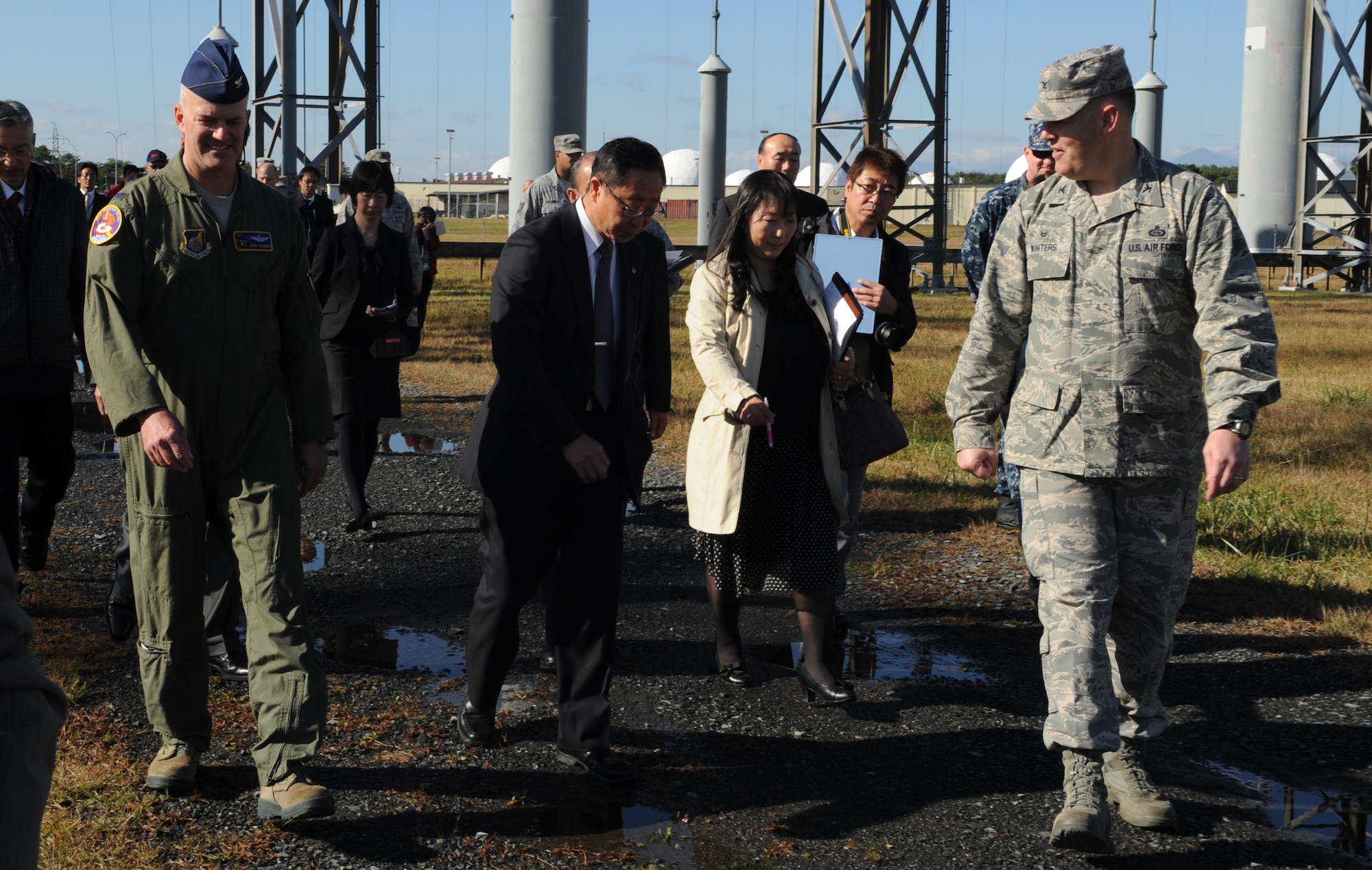 Misawa Air Base leadership conducts a tour of the “Elephant Cage” for Misawa City officials during the demolition ceremony for the structure at Misawa Air Base, Japan, Oct. 15, 2014. The AN/FLR-9 antenna is approximately 1,443 feet in diameter and more than 120 feet tall. (U.S. Air Force photo by Airman Jordyn Rucker/Released)