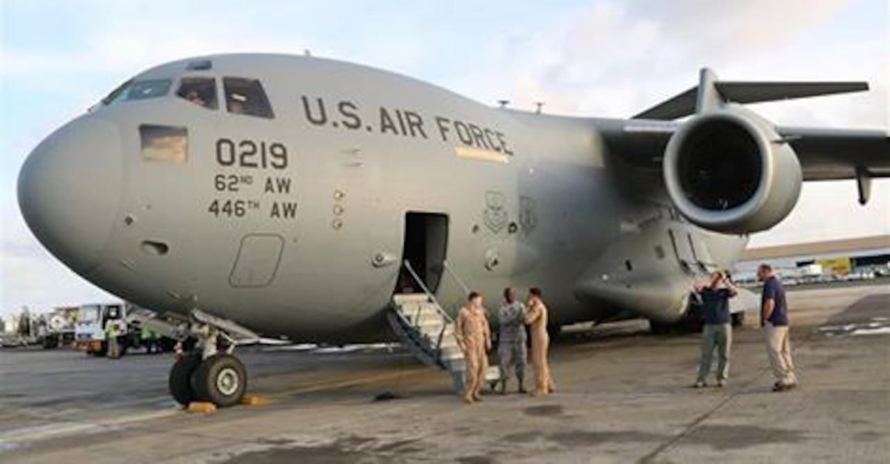 A C-17 U.S. military aircraft arrives in Liberia in September with the first shipment of increased U.S. military equipment and personnel for the anti-Ebola fight, which was promised by President Barack Obama in a Sept. 16 speech at the Centers for Disease Control and Prevention in Atlanta, Ga. Photo by Embassy of the United States of America, Monrovia, Liberia