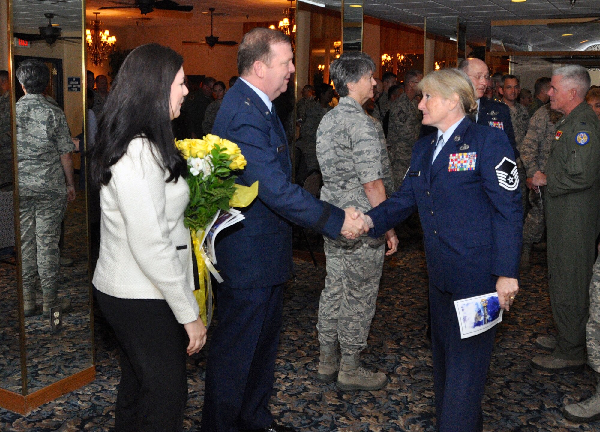 Brigadier General Richard Scobee assumed command of 10th Air Force during a change of command ceremony at Naval Air Station Fort Worth Joint Reserve Base, Texas, October 18, 2014. General Scobee greeted many of the 10th Air Force personnel after the ceremony.