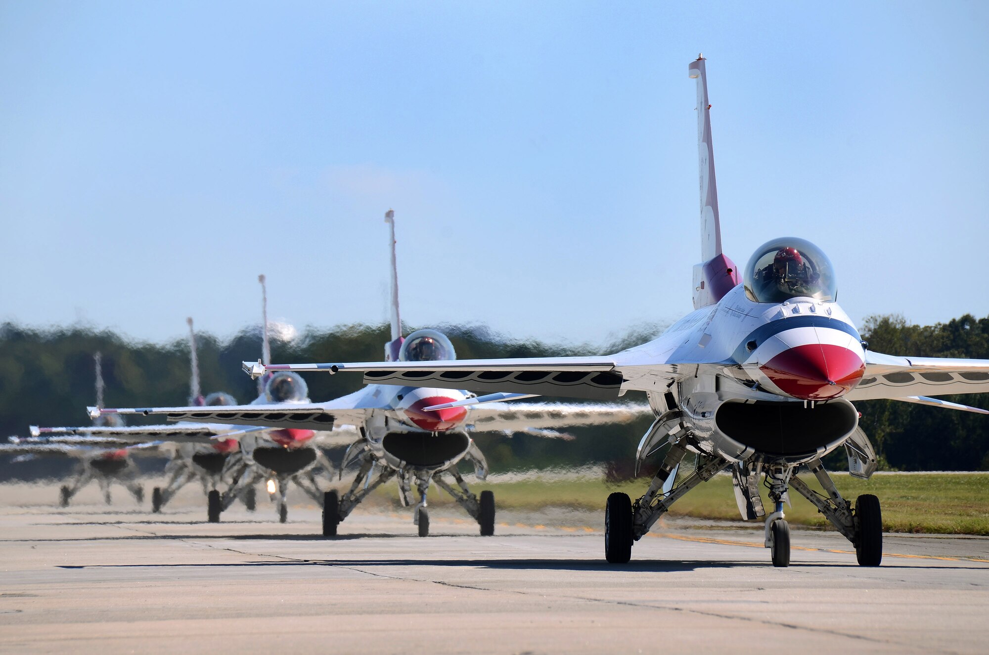 Thunderbird #1 leads the F-16C Fighting Falcons back to their parking spots at Dobbins Air Reserve Base after their practice show in Rome, Georgia, Oct., 17. The USAF Air Demonstration Squadron Thunderbirds are using Dobbins as their base of operations for their performances at the Wings Over North Georgia Air Show this weekend at the Russell Regional Airport in Rome, Georgia. (U.S. Air Force photo/ Brad Fallin)