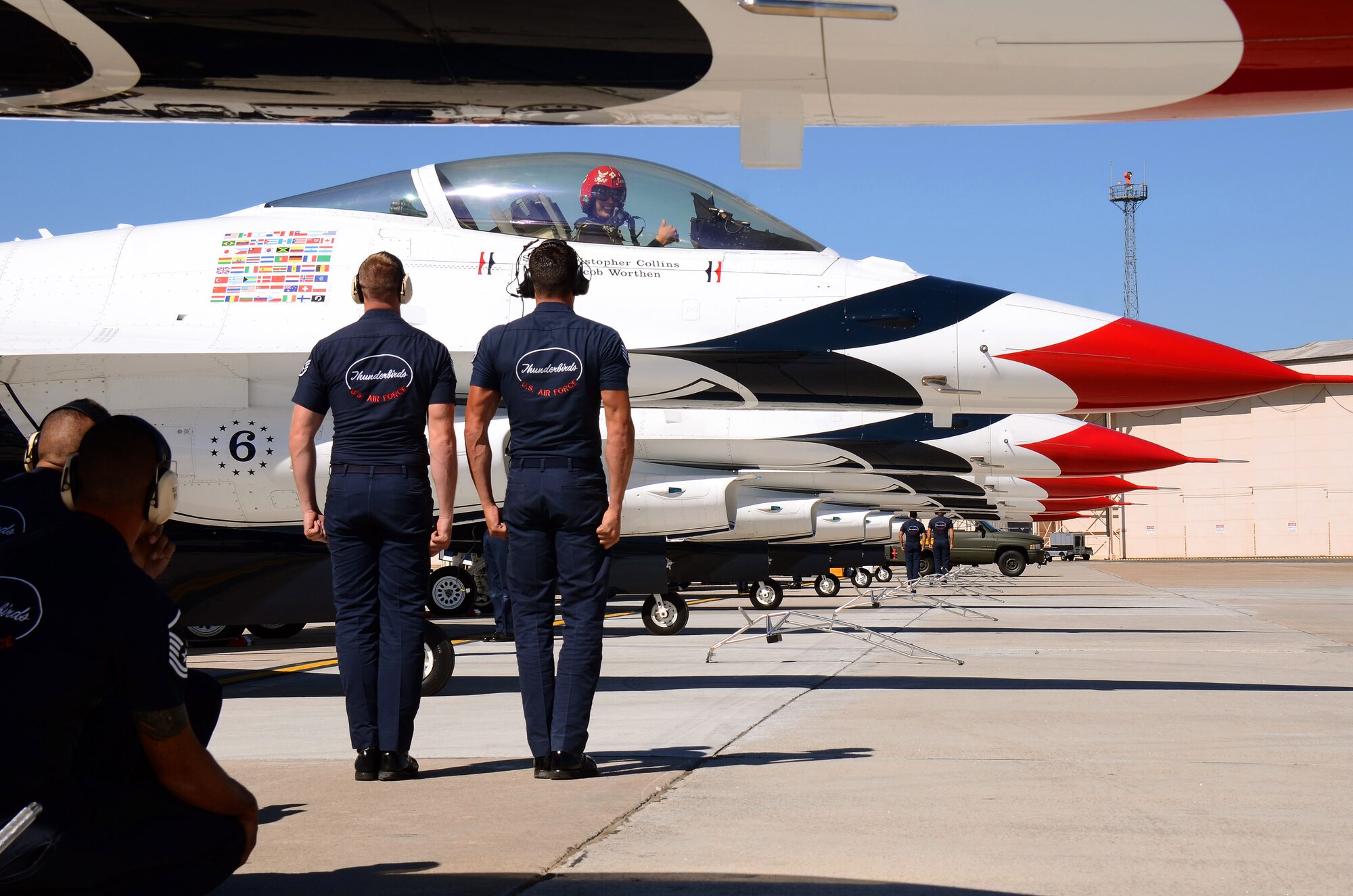 Thunderbirds # 6, opposing solo pilot, Maj. Jason Curtis, is cleared by his ground crew to taxi out from Dobbins Air Reserve Base for the team's practice show in Rome, Georgia, Oct., 17. The USAF Air Demonstration Squadron Thunderbirds are using Dobbins as their base of operations for their performances at the Wings Over North Georgia Air Show this weekend at the Russell Regional Airport in Rome, Georgia. (U.S. Air Force photo/ Brad Fallin)
