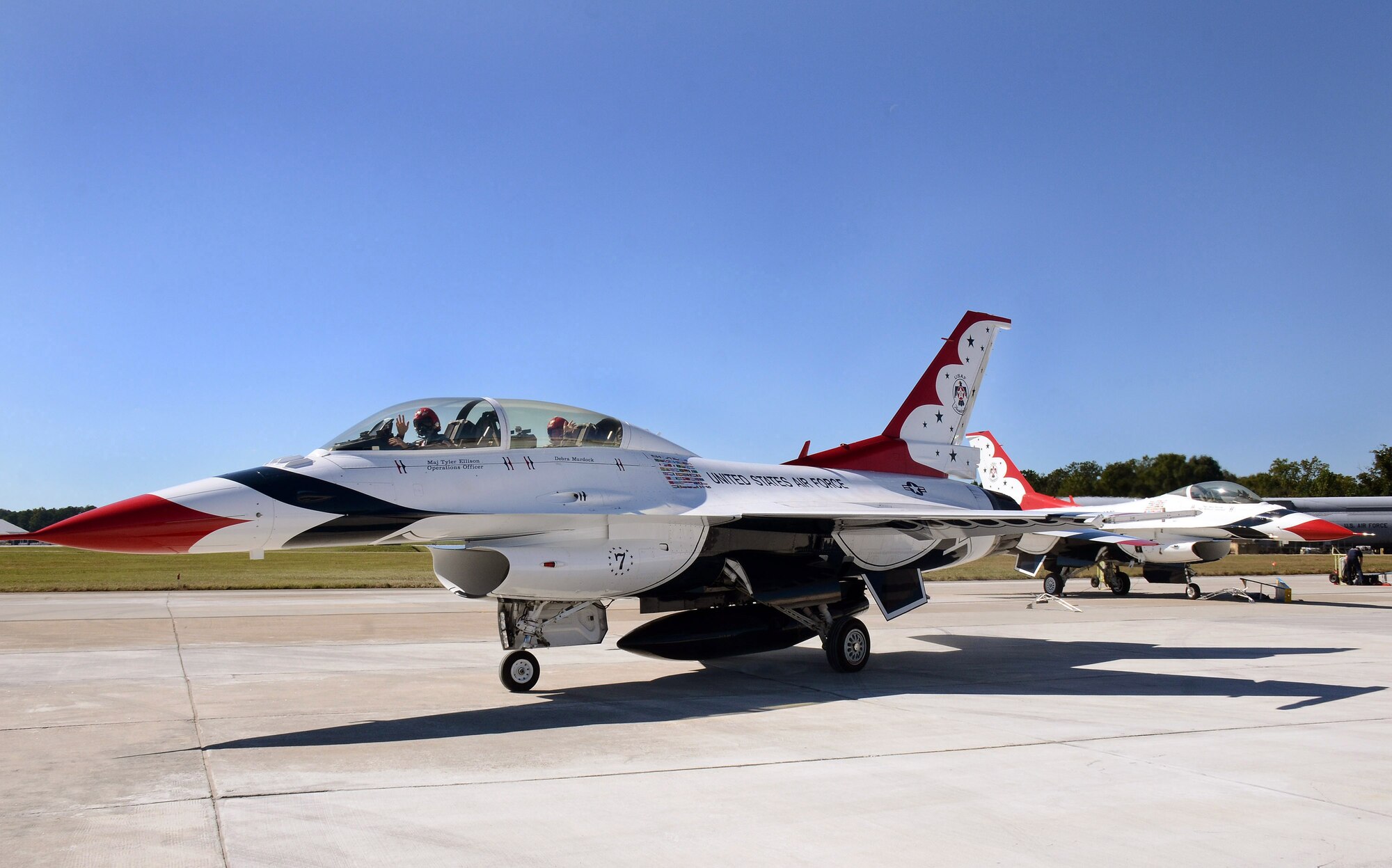 Mrs. Debra Murdock, principal of Cherokee High School in Canton, Georgia, waves from the backseat of the F-16D aircraft as Maj. Tyler Ellison, Thunderbird #7, the squadron's operation officer, taxis out from their parking spot for her Hometown Hero orientation flight at Dobbins Air Reserve Base, Georgia, Oct., 17. The USAF Air Demonstration Squadron Thunderbirds are using Dobbins as their base of operations for their performances at the Wings Over North Georgia Air Show this weekend at the Russell Regional Airport in Rome, Georgia . (U.S. Air Force photo/ Brad Fallin)