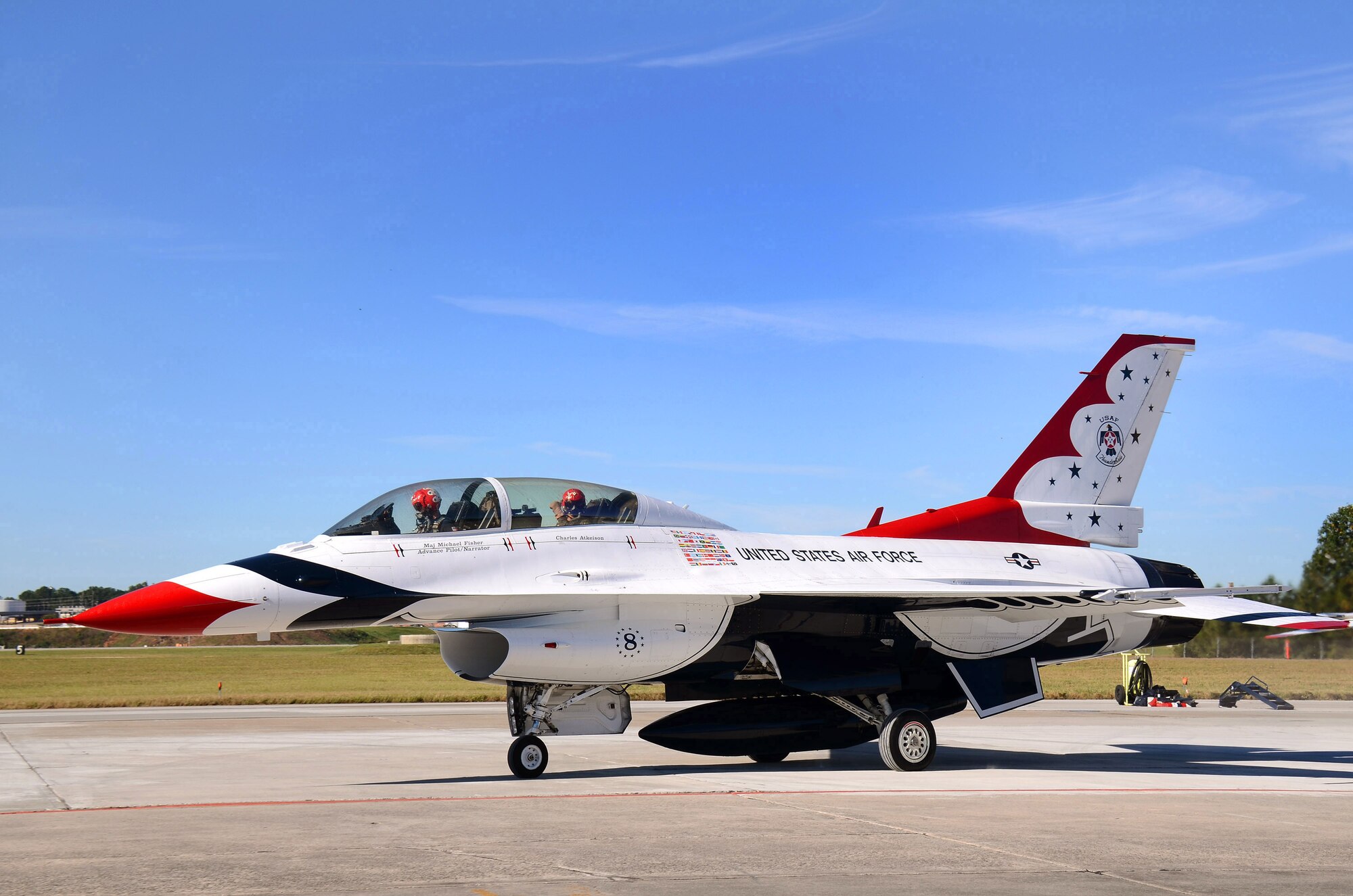 Mr. Charles Atkeison, a CNN contributor, gives a thumbs up from the backseat of the F-16D aircraft as Maj. Michael Fisher, Thunderbirds advance pilot and narrator, taxis out from their parking spot for his media orientation flight at Dobbins Air Reserve Base, Georgia, Oct., 17. The USAF Air Demonstration Squadron Thunderbirds are using Dobbins as their base of operations for their performances at the Wings Over North Georgia Air Show this weekend at the Russell Regional Airport in Rome, Georgia . (U.S. Air Force photo/ Brad Fallin)
