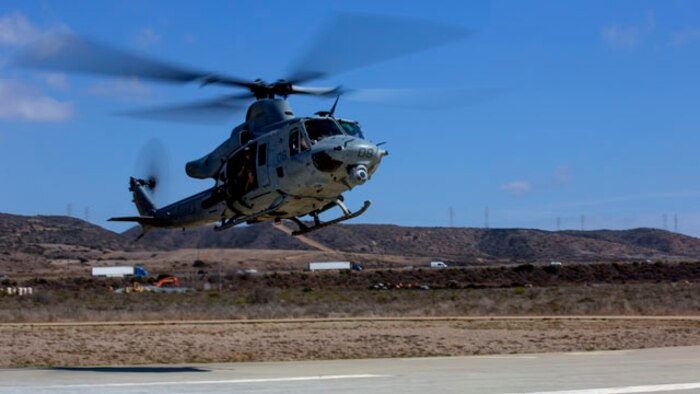 A UH-1Y Huey with Marine Light Attack Helicopter Squadron 369 “Gunfighters,” prepares to land during a familiarization flight aboard Marine Corps Air Station Camp Pendleton, Calif., Oct. 16. Pilots and crews practiced basic flight operations like landings and take offs several times in succession to hone their skills.